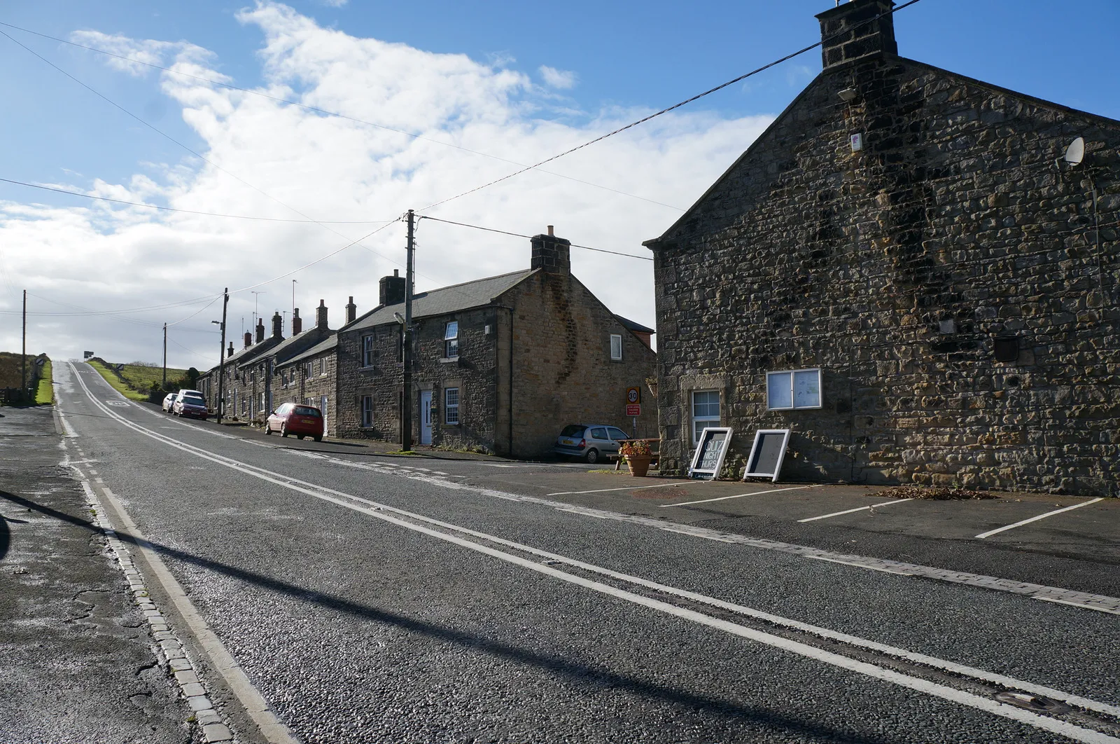 Photo showing: Houses on the A68 at Ridsdale