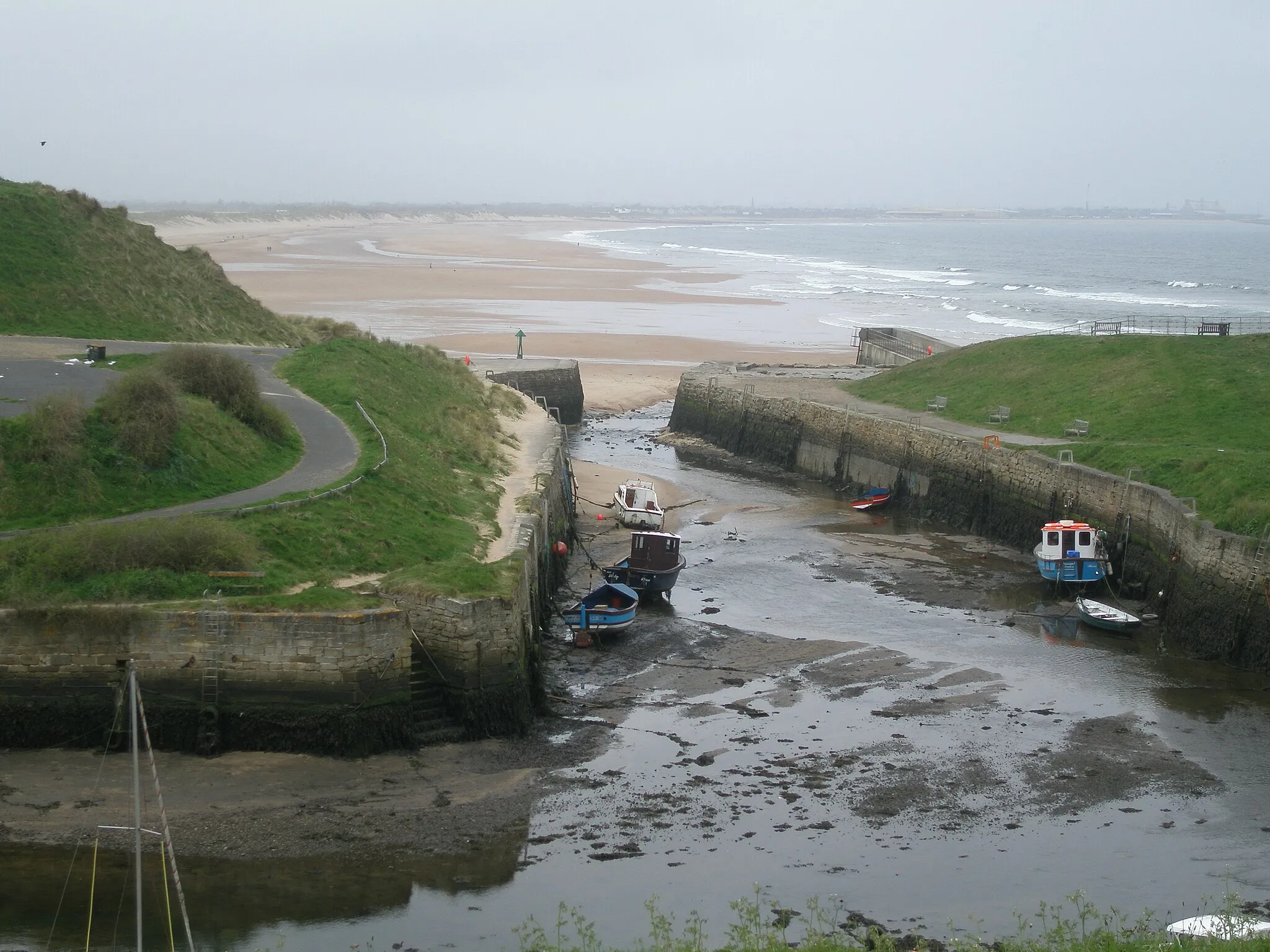 Photo showing: Seaton Sluice Harbour looking north towards the harbour mouth with Blyth Sands beyond.