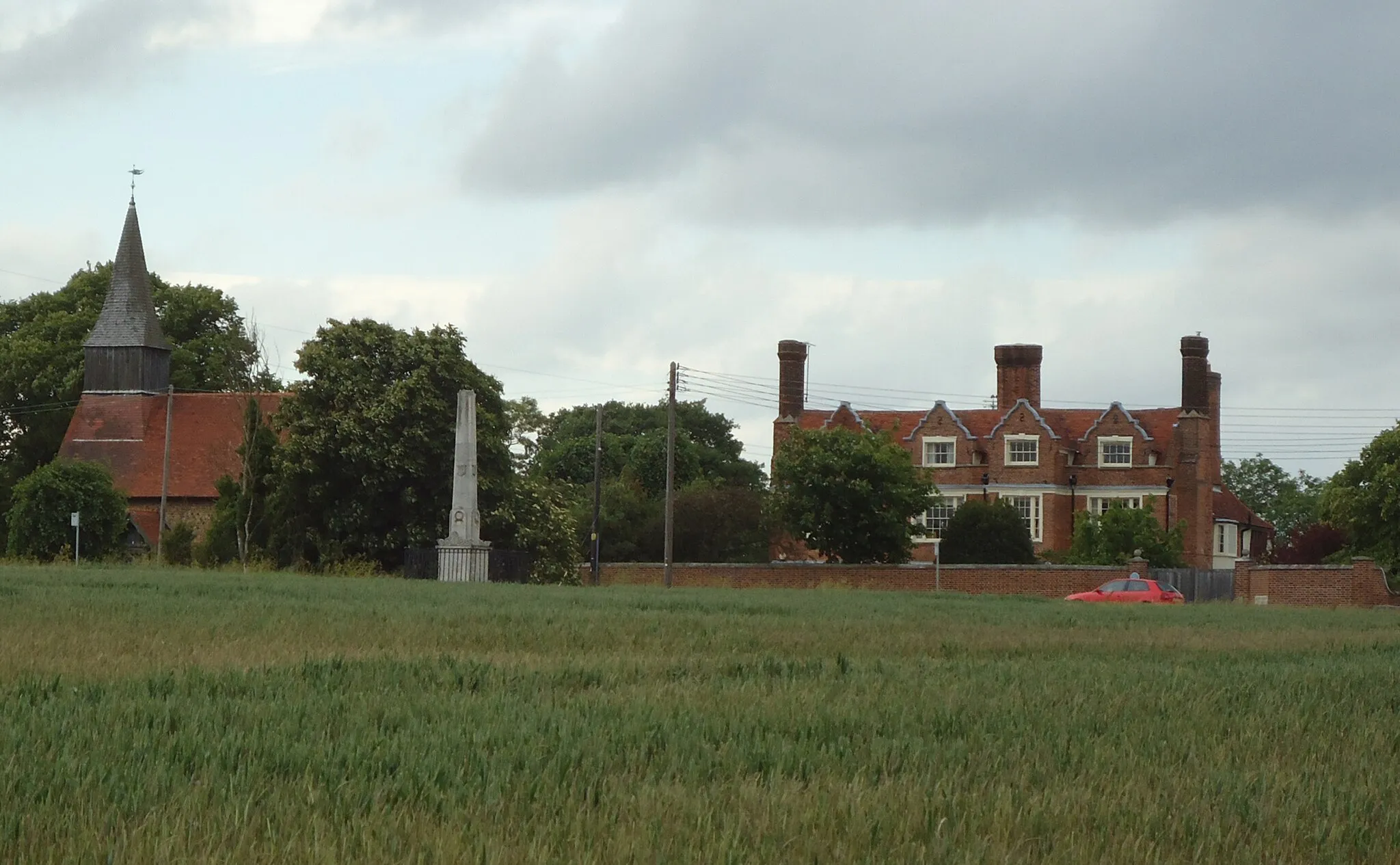 Photo showing: Church, hall and memorial