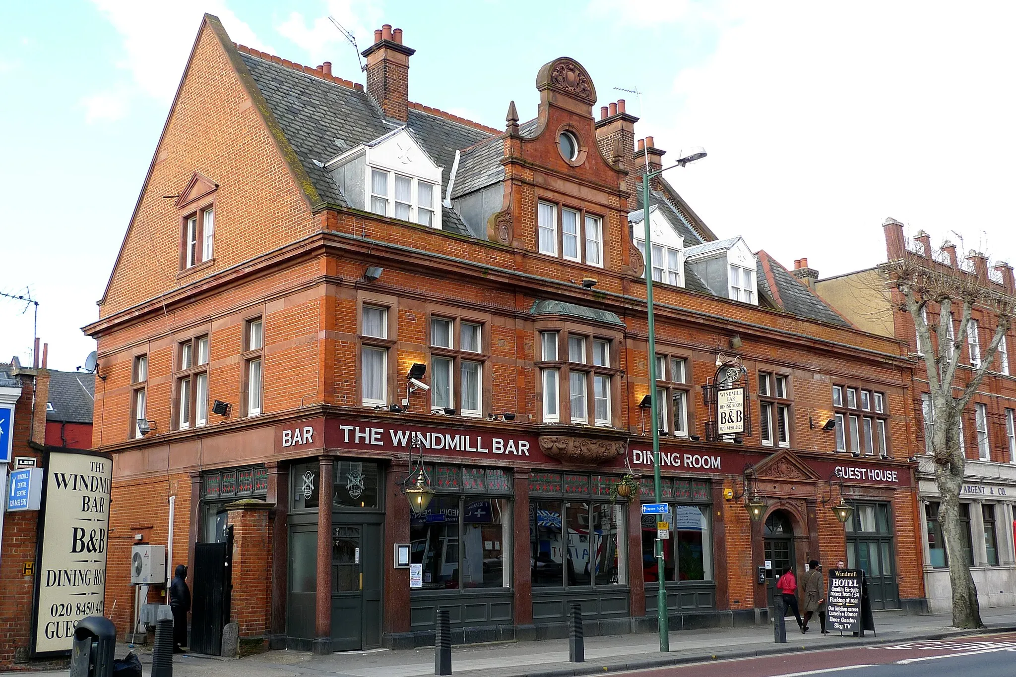 Photo showing: One of the older drinking establishments on this stretch of road.
Address: 57 Cricklewood Broadway.
Former Name(s): The Windmill Hotel.
Owner: (website); Punch Taverns [Spirit Group] (former); Taylor Walker (former).
Links:
Fancyapint
Beer in the Evening

Dead Pubs (history)