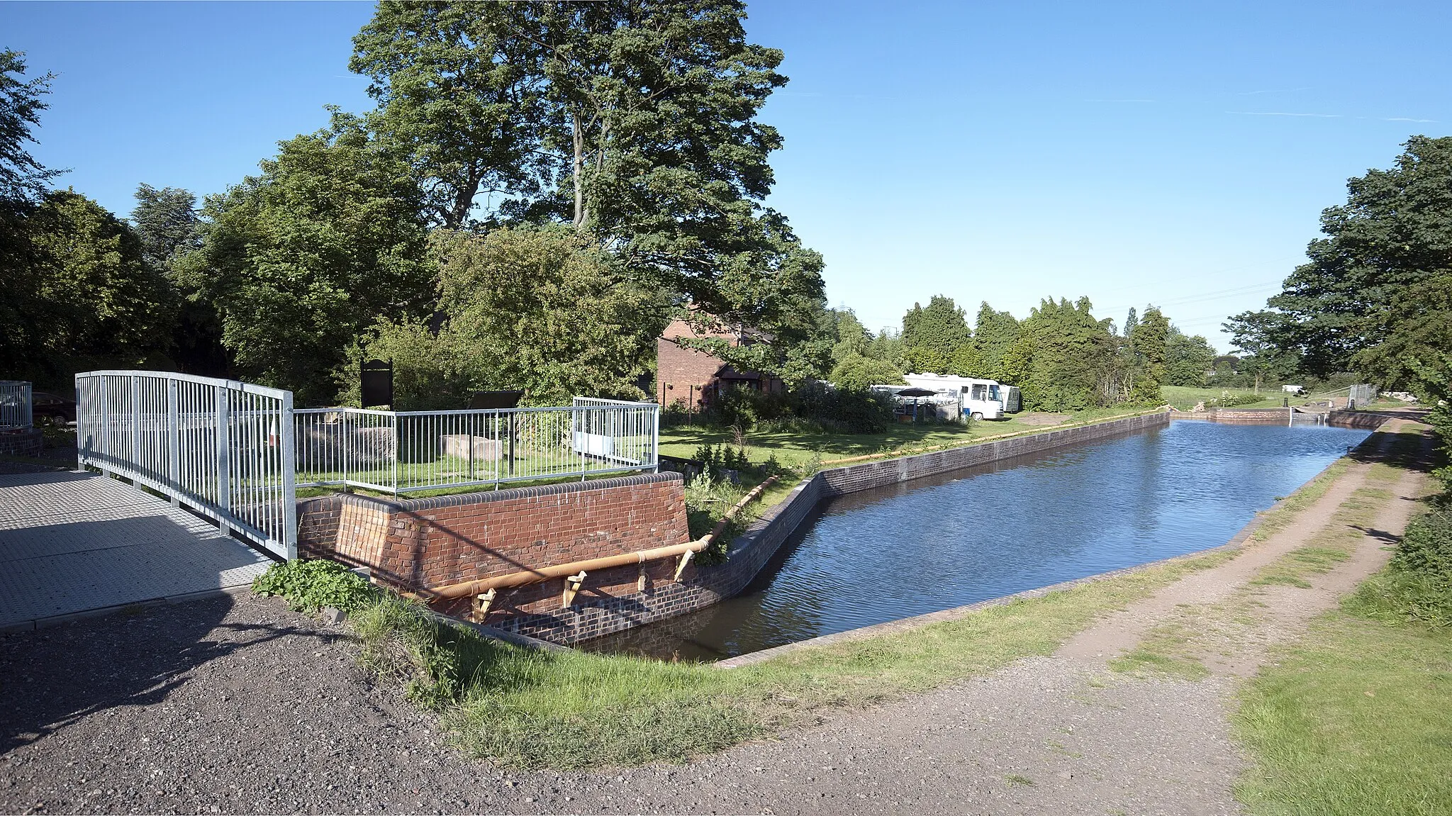 Photo showing: Lichfield Canal between Lock 25 and 26. The first part of the restored canal to be re-watered in April 2011.