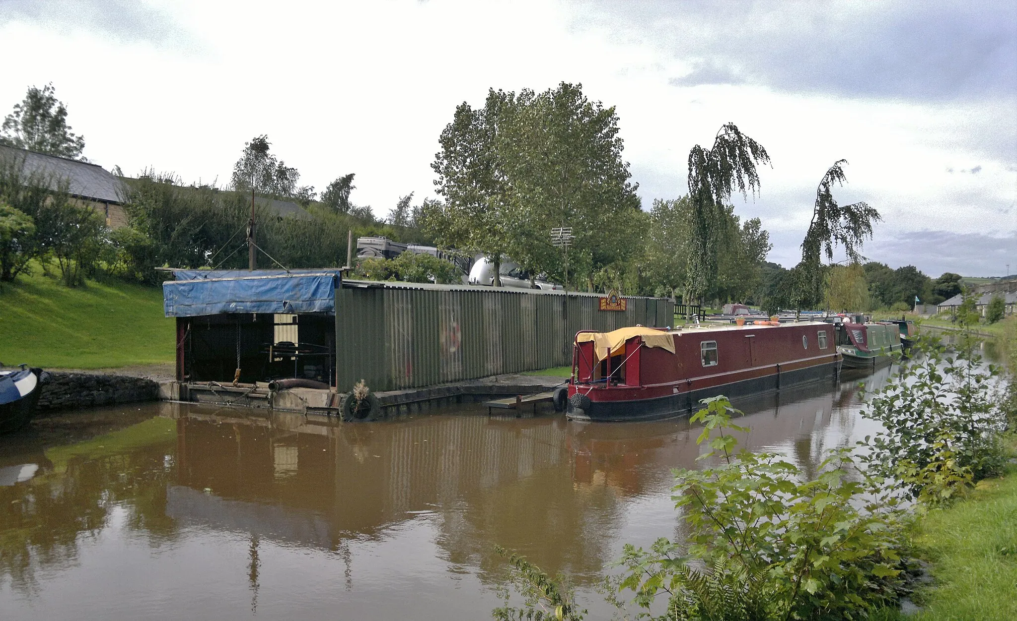 Photo showing: Boat painters at Furness Vale Dry Dock on Peak Forest Canal