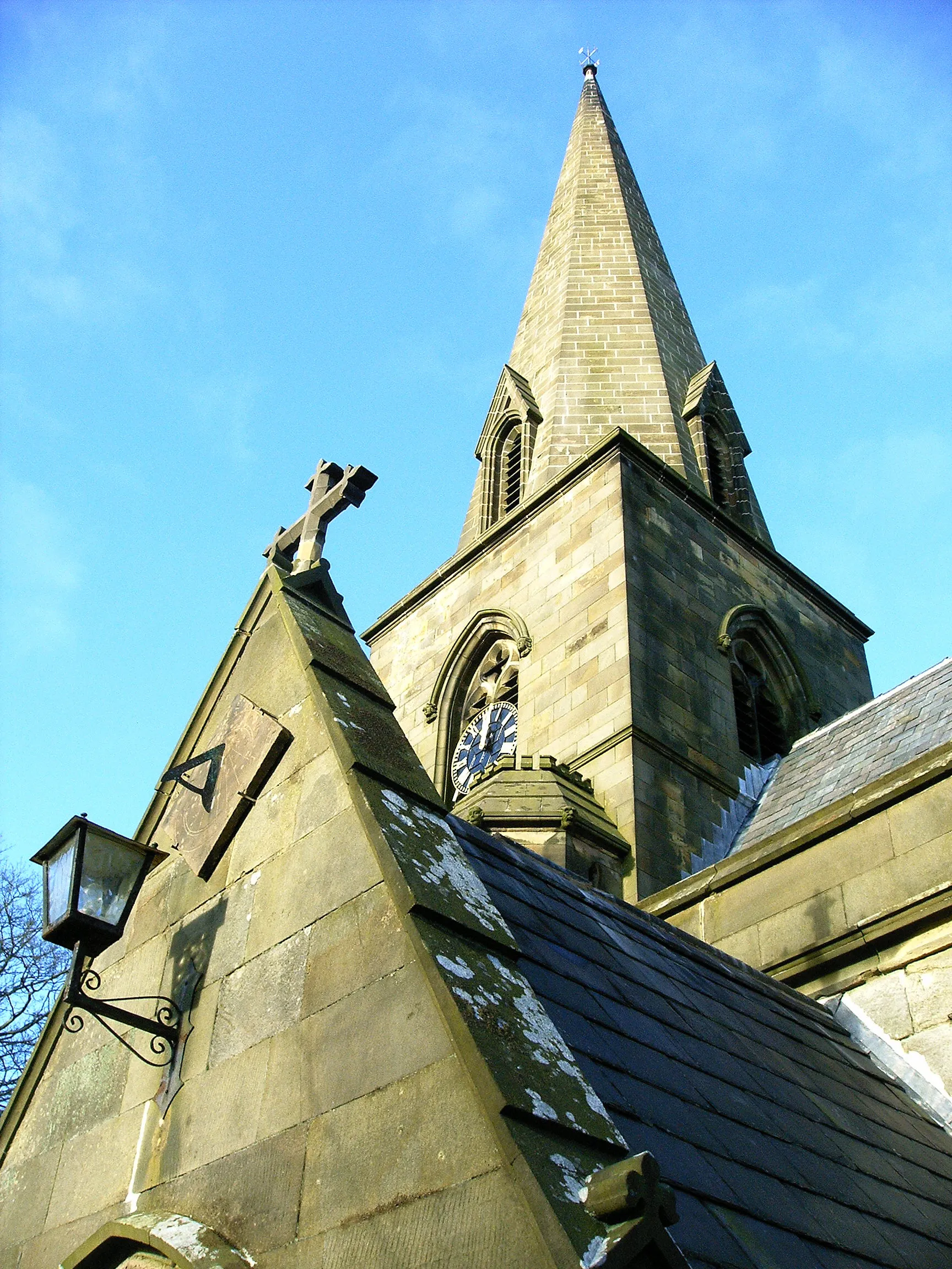 Photo showing: Detail of Grindon Church showing carvings and sundial