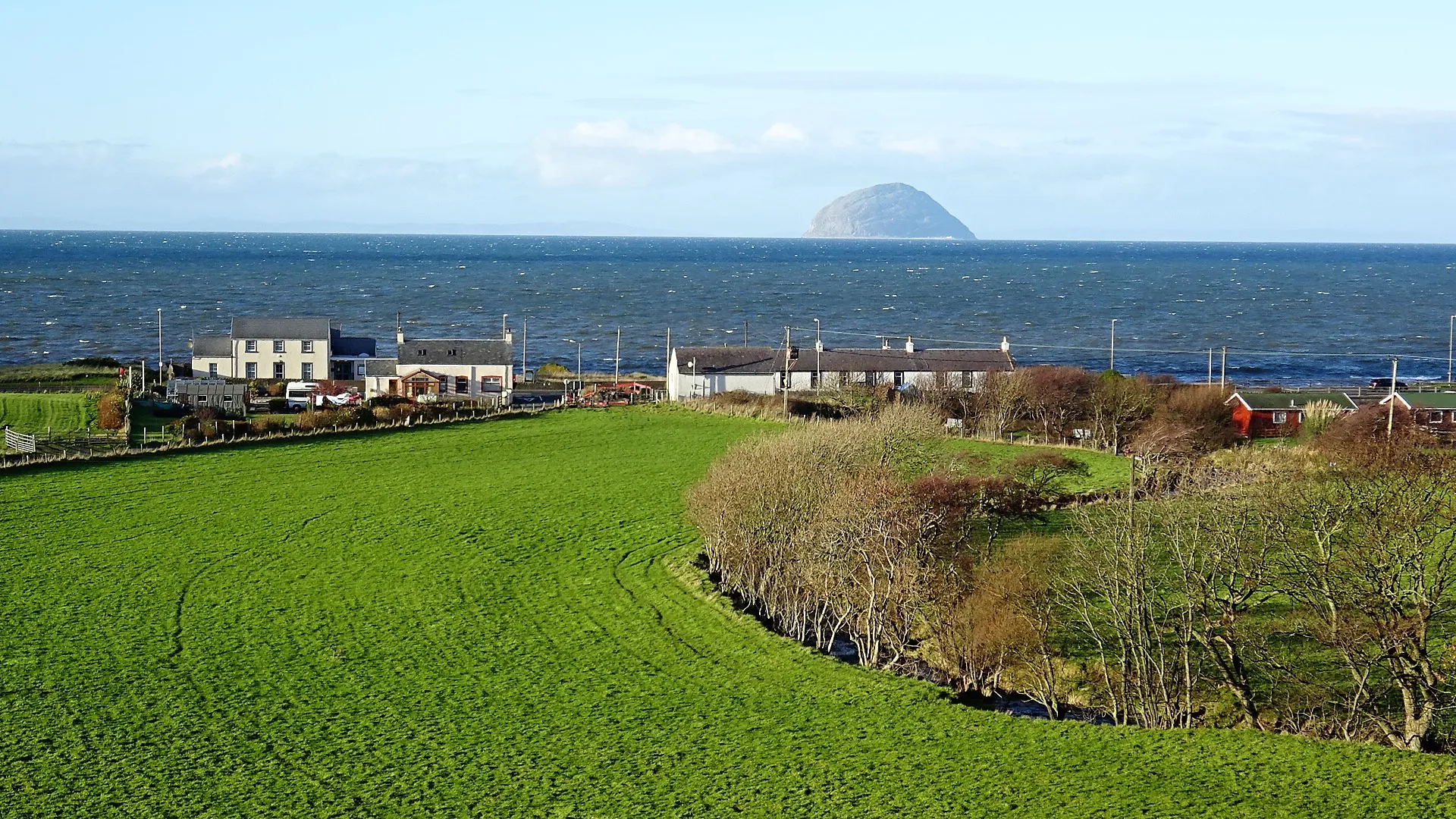 Photo showing: Lendalfoot from Little Carleton Farm, Lendalfoot, South Ayrshire, Scotland. Ailsa Craig in the background.