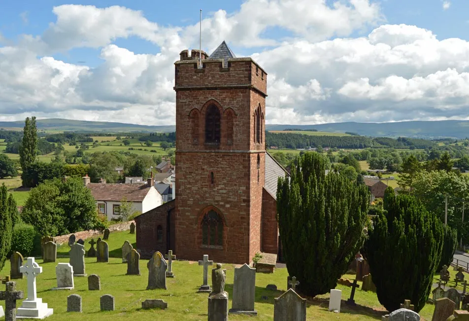 Photo showing: The parish church of  St. Nicholas Lazonby, Cumbria.  The church occupies a prominent position looking over the Eden valley and was rebuilt in 1864-6 to a design by Anthony Salvin,