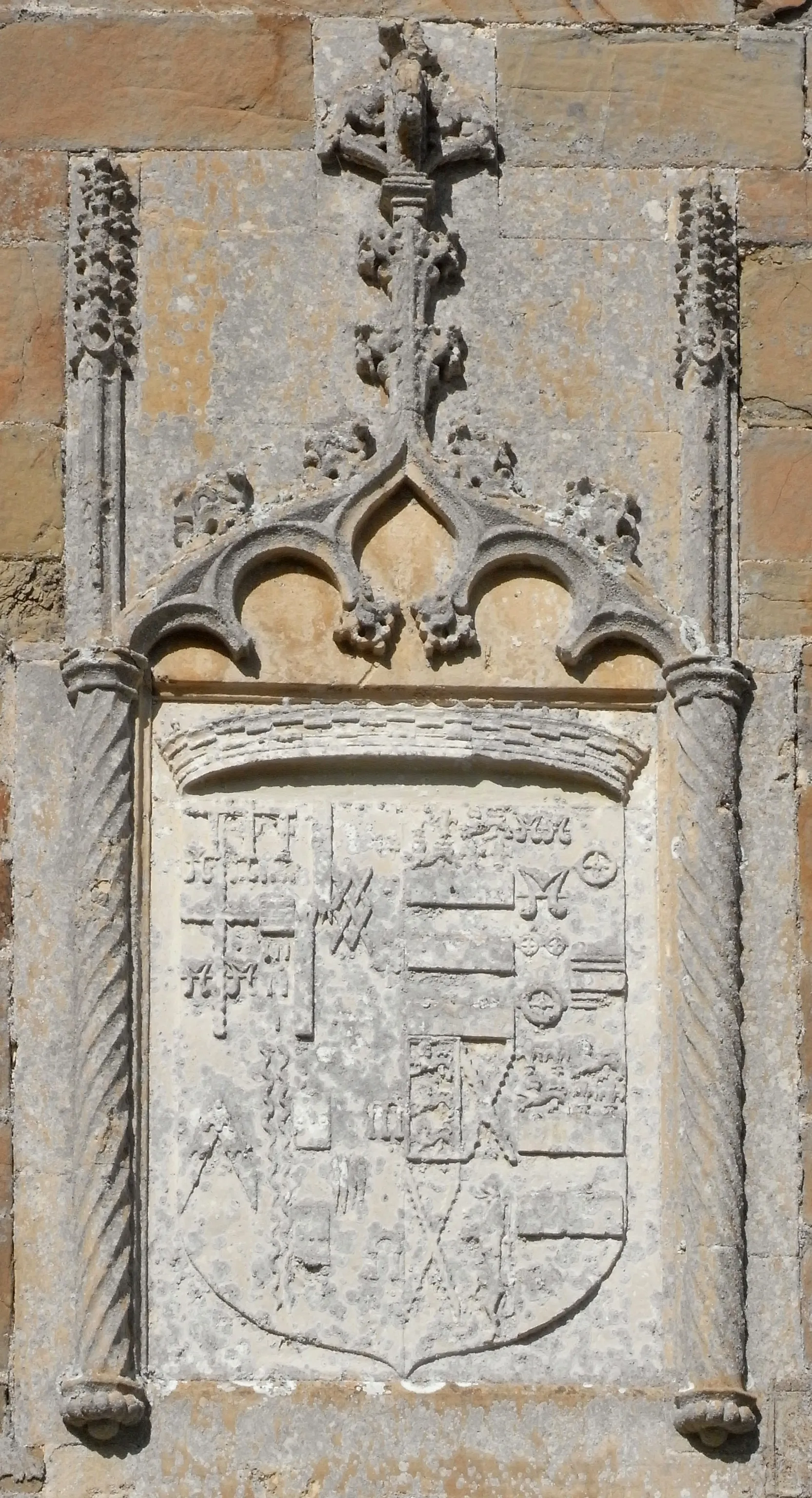 Photo showing: Arms of Bourchier impaling Manners, as sculpted above SE door to Tawstock Church, Devon Arms of Bourchier impaling Manners, sculpted above SE door to Tawstock Church, Devon. Representing arms of John Bourchier, 2nd Earl of Bath (1499-1560/61) with 10 quarterings (as also shown on the gatehouse of Tawstock Court and on the monument of Lady Frances Bourchier (d.1612) in the Bedford Chapel, Chenies, Buckinghamshire, daughter of the 3rd Earl of Bath [1]):

1)Argent a cross engrailed gules between four water bougets sable (Bourchier)
2) Gules, a fess argent between 15 billets or  5,4,3,2,1 (Louvaine) (across the first two quarters is a label of three points for difference)
3)Quarterly per fess indented argent and gules (FitzWarin)
4)Gules, a fret or (Audley)
5)Argent, three aspen leaves erect gules (Cogan)
6)Sable, a chevron barry nebuly argent and gules (Hankford)
7)Argent, two bars wavy sable (Stapledon)
8)Argent, two bars gules each charged with three bezants (Martin)
9)Gules, four fusils in fess ermine (Dinham)
10)Gules, three pairs of arches argent (Arches)) Impaling arms of his 2nd wife Eleanor Manners, daughter of George Manners, 11th Baron de Ros (c.1470-1513) with 4 grand quarterings:

1st & 4th: Or, two bars azure a chief quarterly azure and gules; in the 1st and 4th quarters two fleurs-de-lis and in the 2nd and 3rd a lion passant guardant all or (Manners)
2nd: quarterly of 4:
1: Gules, three water bougets argent (de Ros)
2: Azure, a Catherine wheel or (Belvoir)
3: Gules, three catherine wheels argent (Espec, for Walter Espec)
4: Argent, a fess between two bars gemeles gules (Badlesmere, for Giles de Badlesmere, 2nd Baron Badlesmere (1314–1338), as shown for Guncelin de Badlesmere, on the Herald's Roll of Arms[2] also on  The Camden Roll, D189 & St George's Roll, E473)
3rd: quarterly,
1st: within a bordure the Arms of Plantagenet (Thomas Holland, 2nd Earl of Kent);
2nd & 3rd: Argent, a saltire engrailed gules (Sir John Tiptoft, 1st Baron Tiptoft, husband of Joyce Charleton and father of Philippa Tiptoft, wife of Thomas de Ros, 9th Baron Ros (d.1467));
4th: Or, a lion rampant gules (Edward Charleton, 5th Baron Charleton of Powys (1370-1421), husband of Alianore Holland)