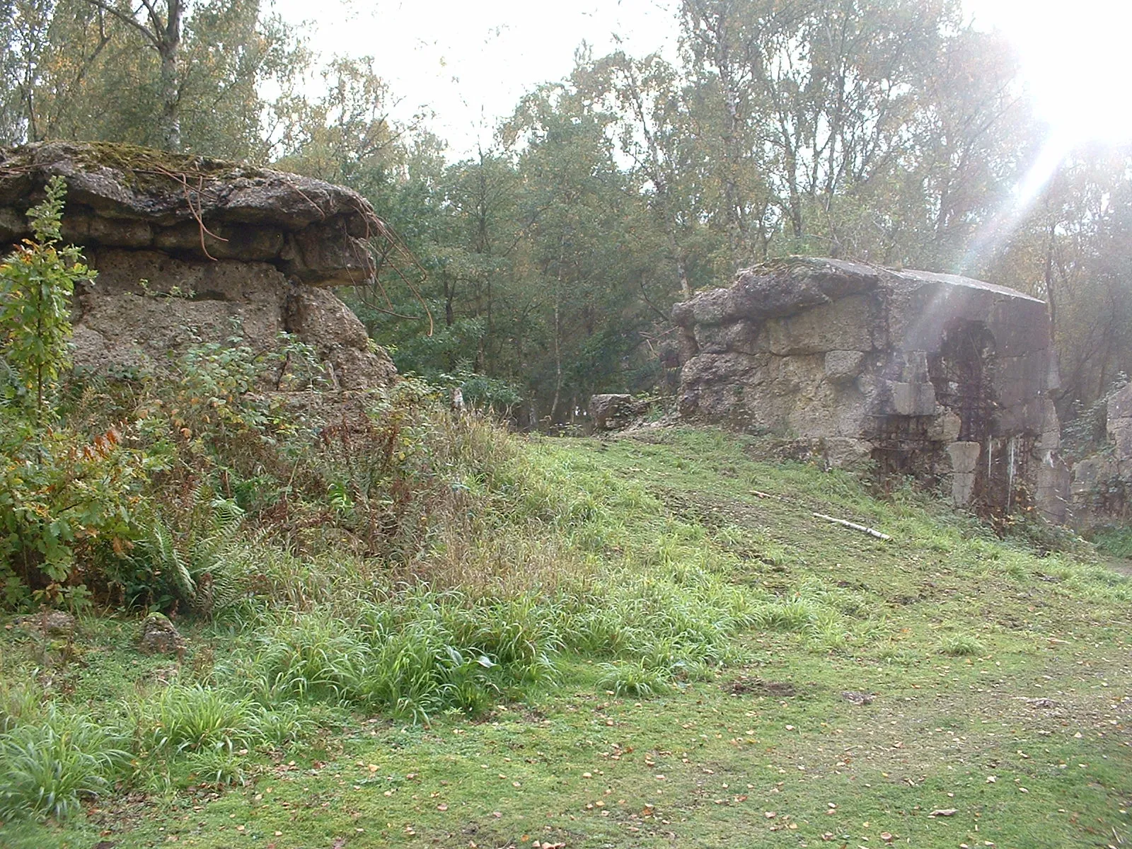 Photo showing: An image of a reconstruction of the Atlantic Wall constructed at Hankley Common in the UK in 1943 for the purpose of training prior to D-day. This image shows a large breech blown in the wall.