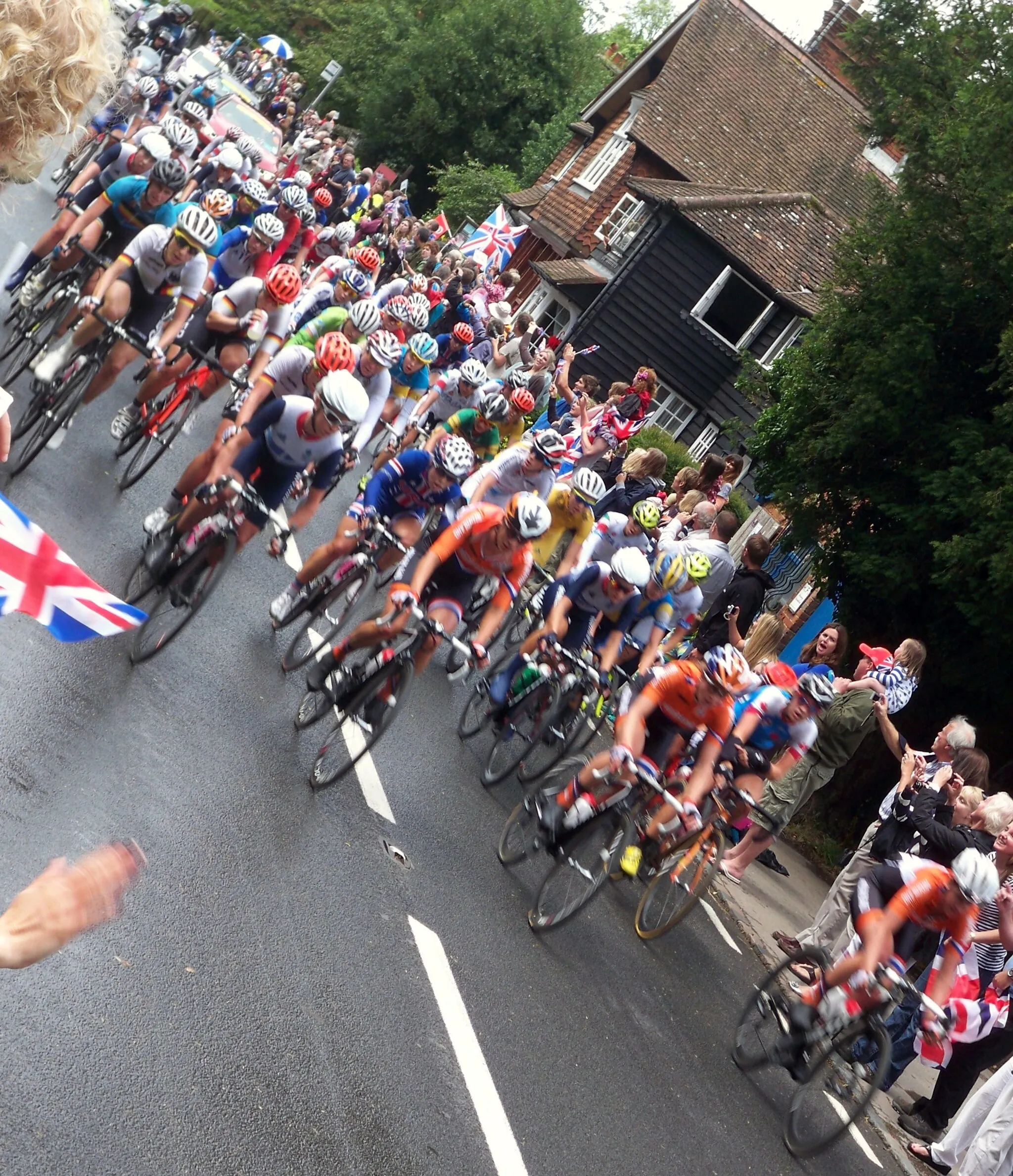 Photo showing: The 2012 Women's Olympic Cycling Road Race passing through Abinger Hammer.