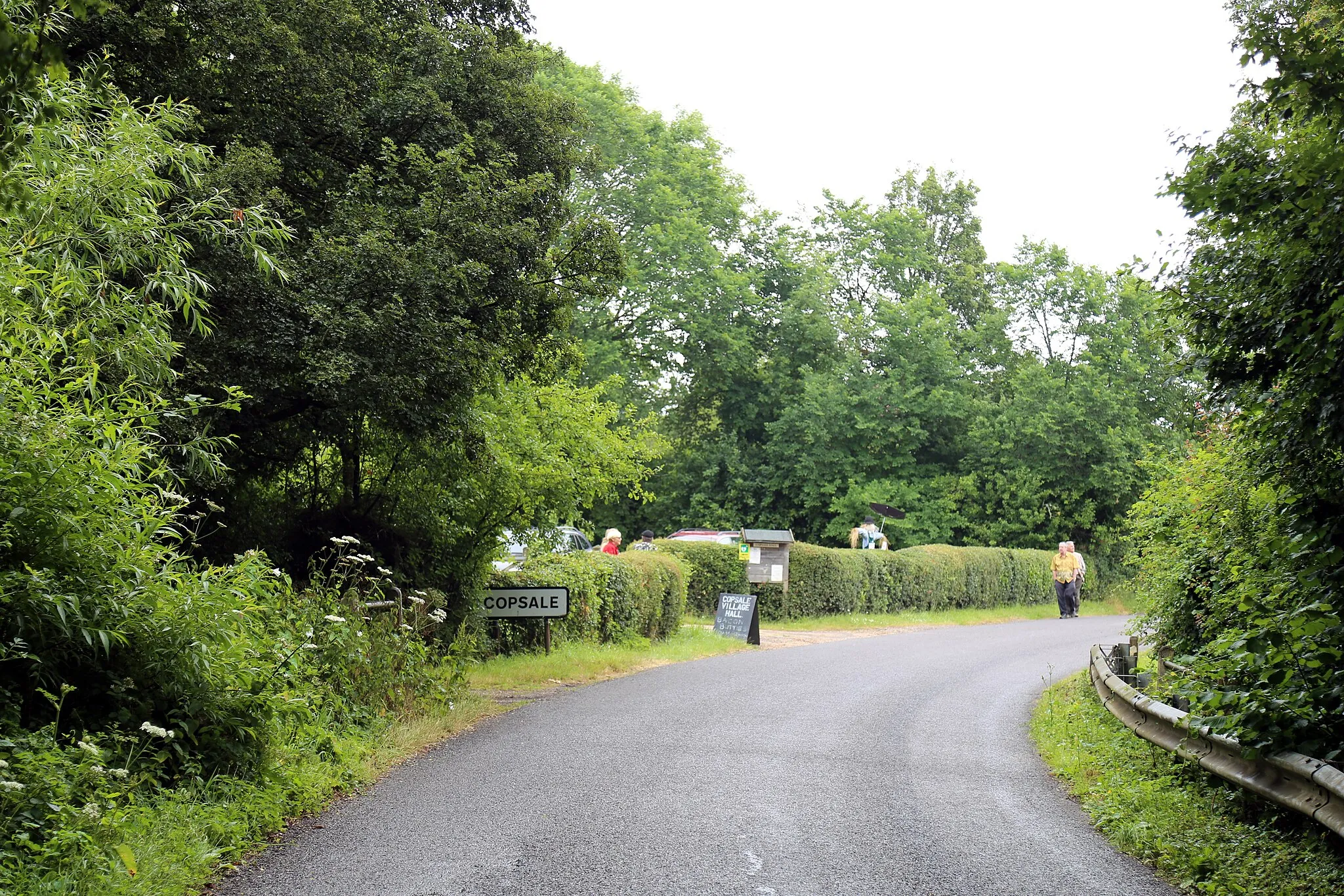 Photo showing: A recently relaid asphalt road into the hamlet of Copsale, in the Nuthurst civil parish of West Sussex, England