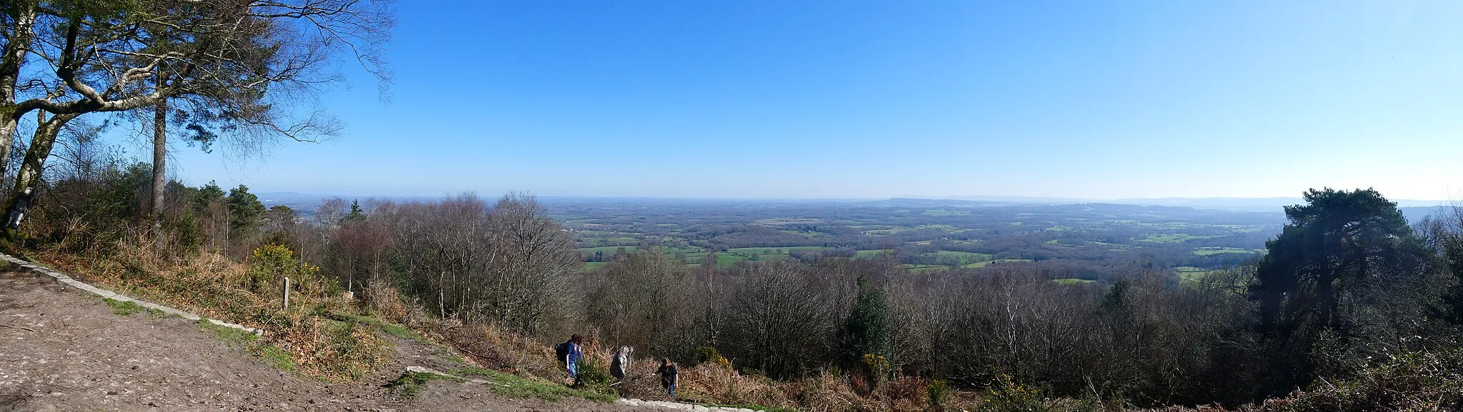 Photo showing: Taken in mid March 2022, shows West Sussex and Hampshire from a height of approx 270meters (917 feet) from the viewpoint known as Temple Of The Winds.