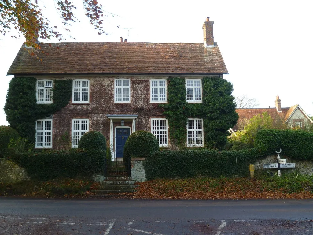 Photo showing: House and signpost at Elsted crossroads