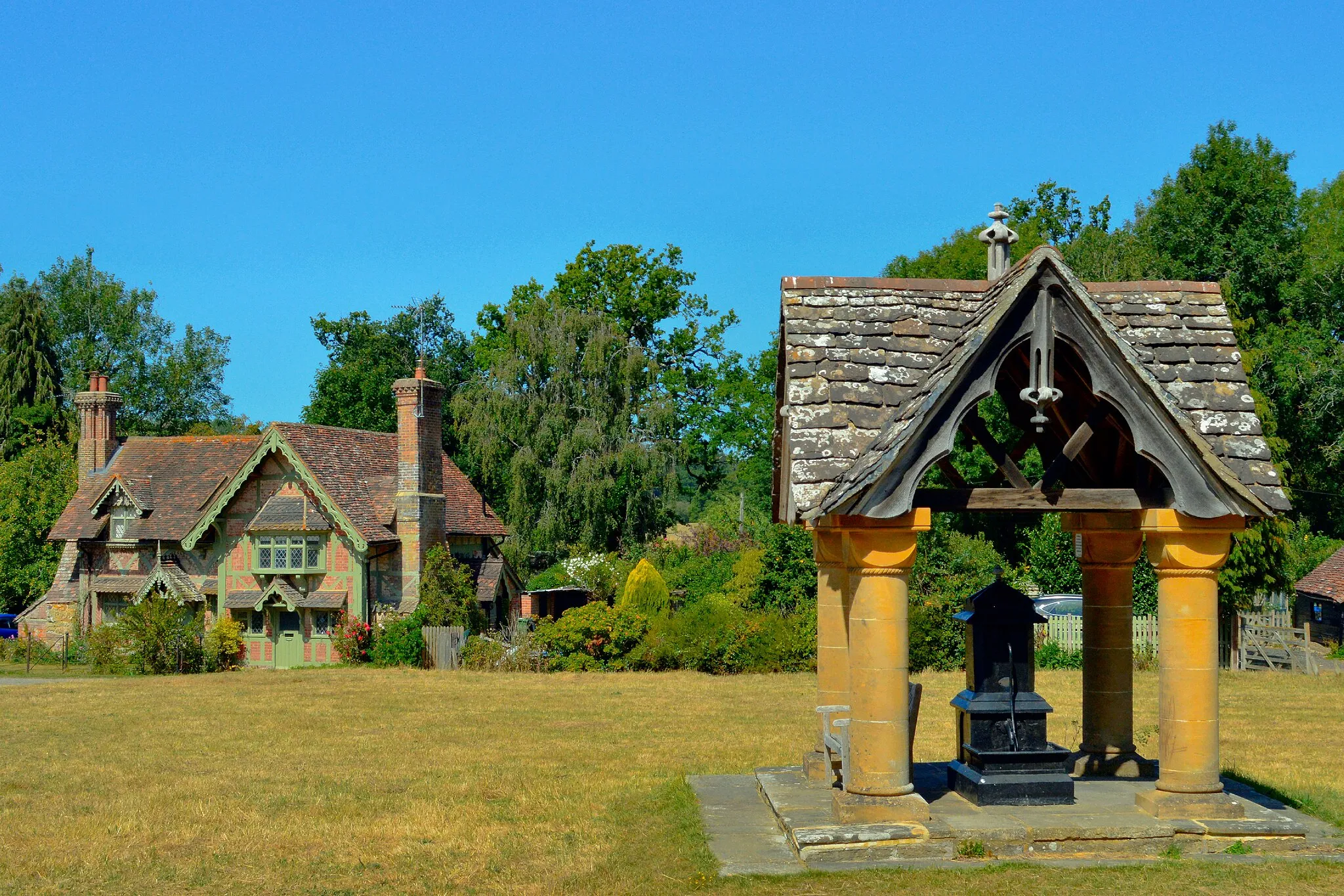 Photo showing: Ockley Green with pump and old house