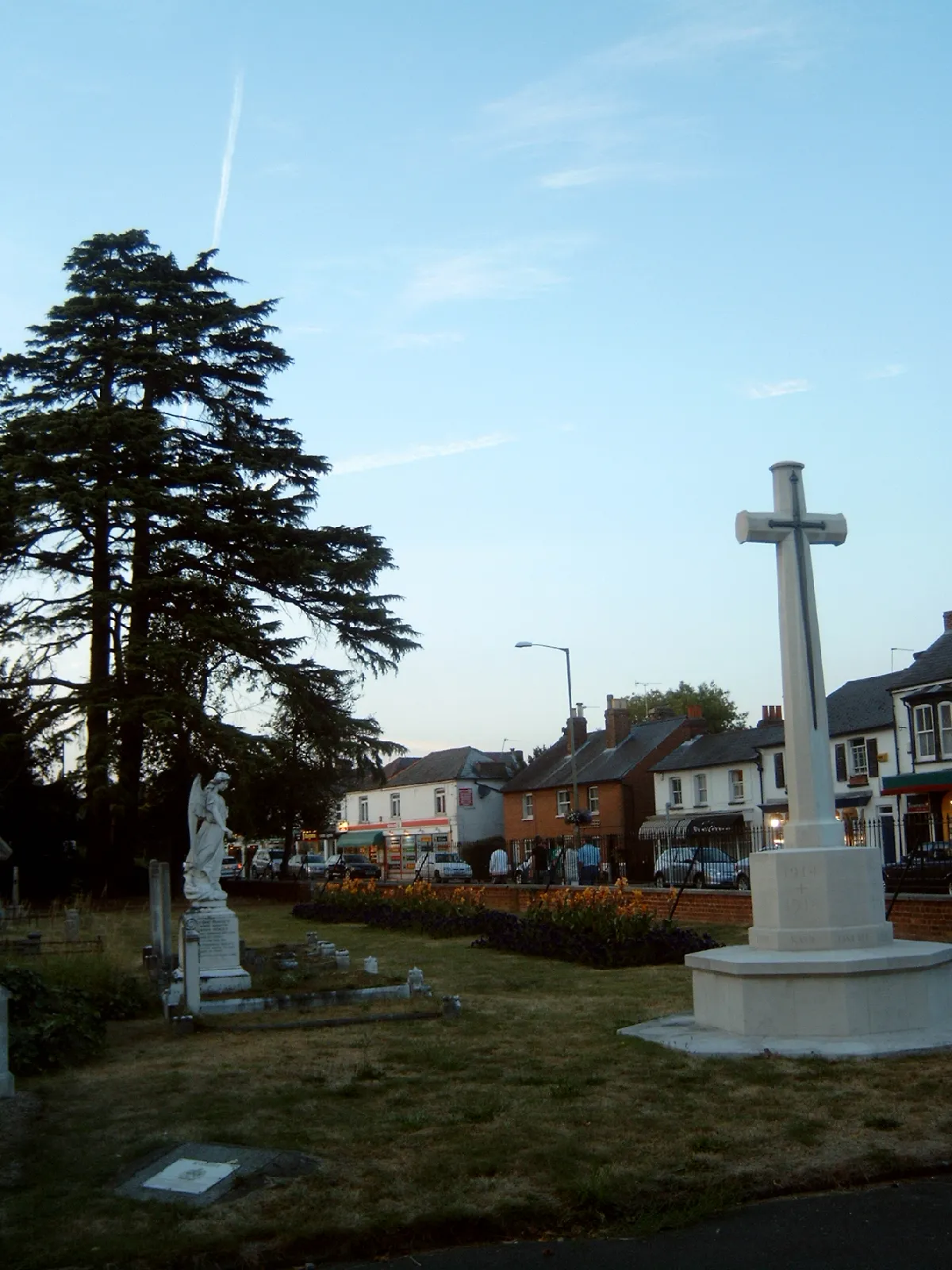 Photo showing: The war memorial and St Judes Road shops in Englefield Green.