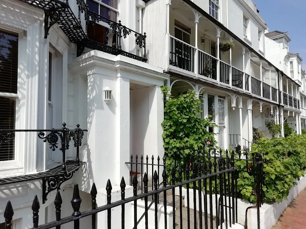 Photo showing: Regency Townouses in Ambrose Place, Worthing