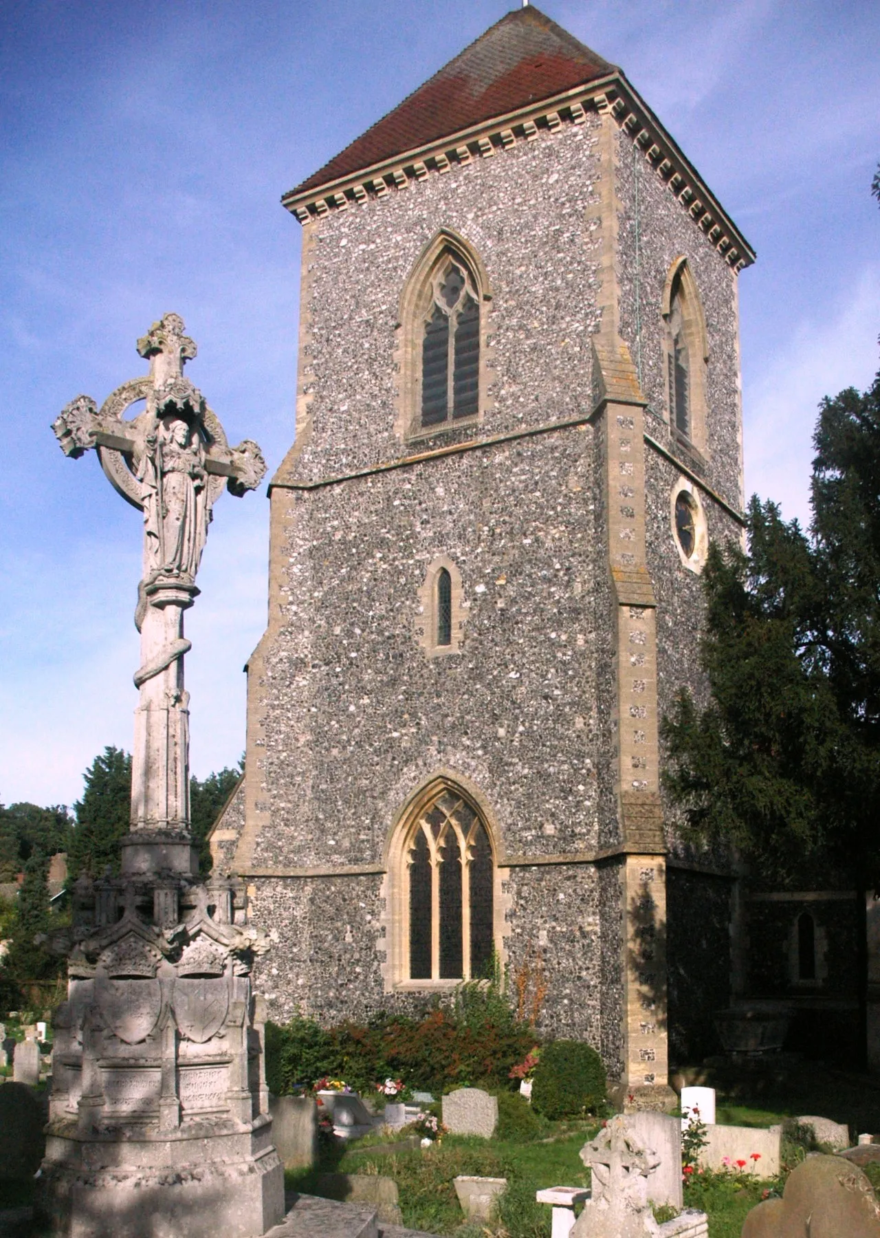 Photo showing: West tower of St Mary's parish church, Addington, London Borough of Croydon, with the memorial to five Archbishops in the left foreground