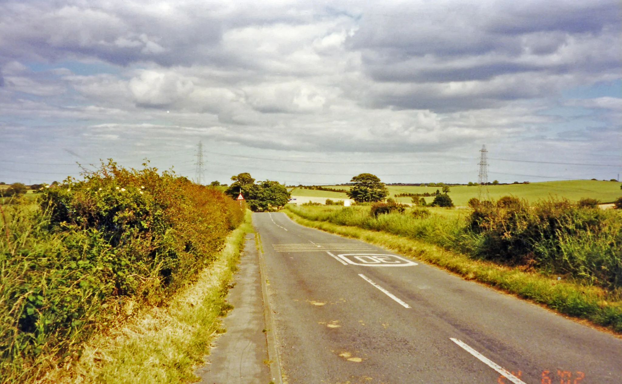 Photo showing: Approaching site of Haswell station, 2002.
View eastward, towards Easington: the ex-NER Sunderland - Murton - Wellfield - Stockton/Hartlepool line crossed in the middle distance - Sunderland, left; Wellfield, Stockton right. Hasswell station was on the right, closed to passengers 9/6/52, to goods 5/12/66 when the line closed.