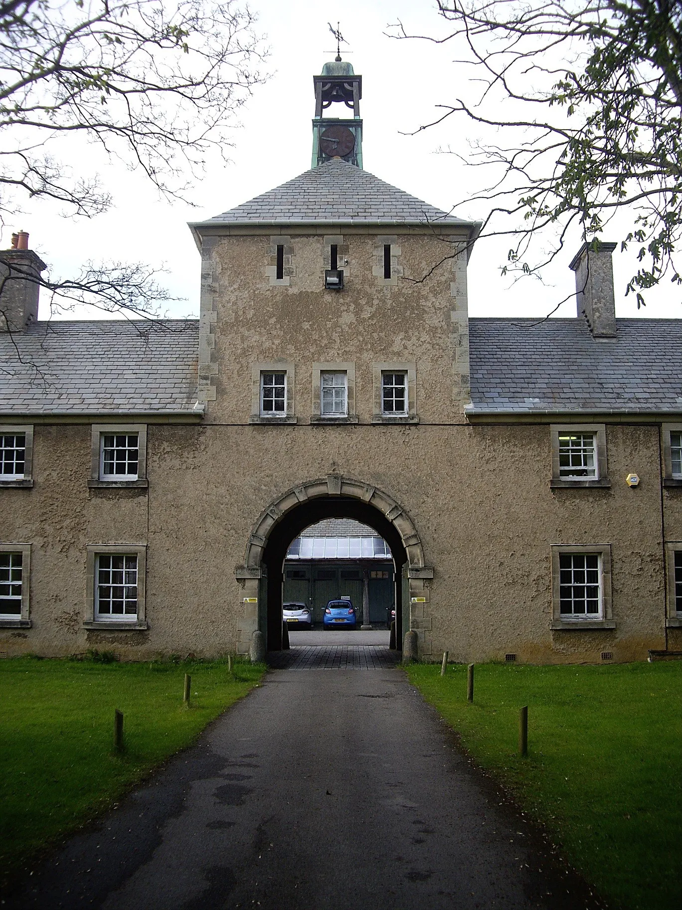 Photo showing: Archway entrance to stable yard