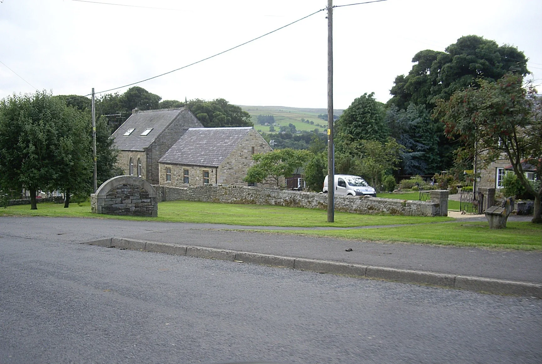 Photo showing: Village Green and Millennium Bench