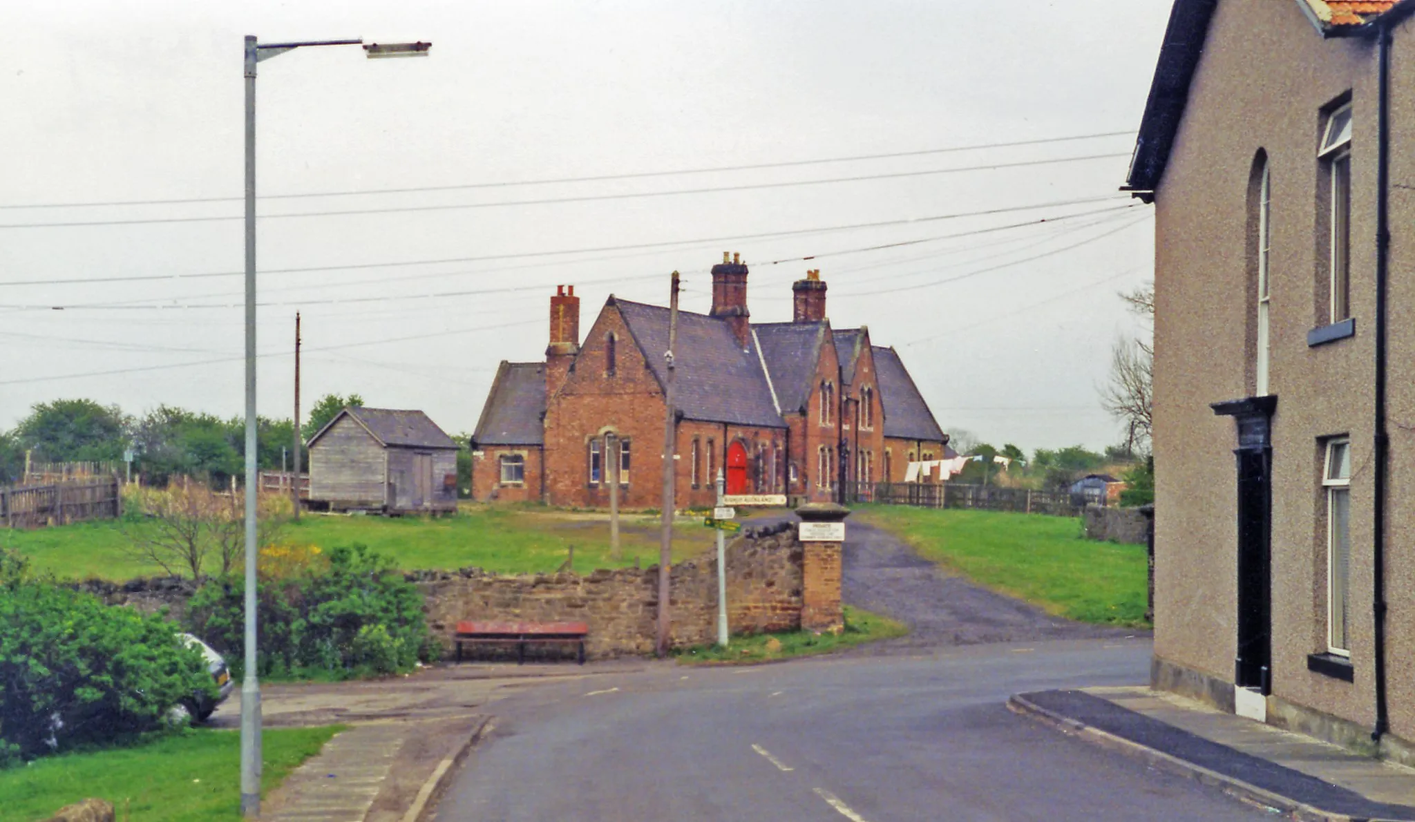 Photo showing: Etherley: former station, 1995.
View NE, towards Bishop Auckland: ex-NE lines west and north from Bishop Auckland to:- Wearhead (closed (passengers) 29/6/53, goods later, until 1994 to Eastgate), Tow Law (closed 11/6/56, to Crook (8/3/65, goods 1/11/65). The station has been reopened occasionally since 1991 as 'Witton Park' for excursions, but is not available yet on the heritage Weardale Railway which passes through.