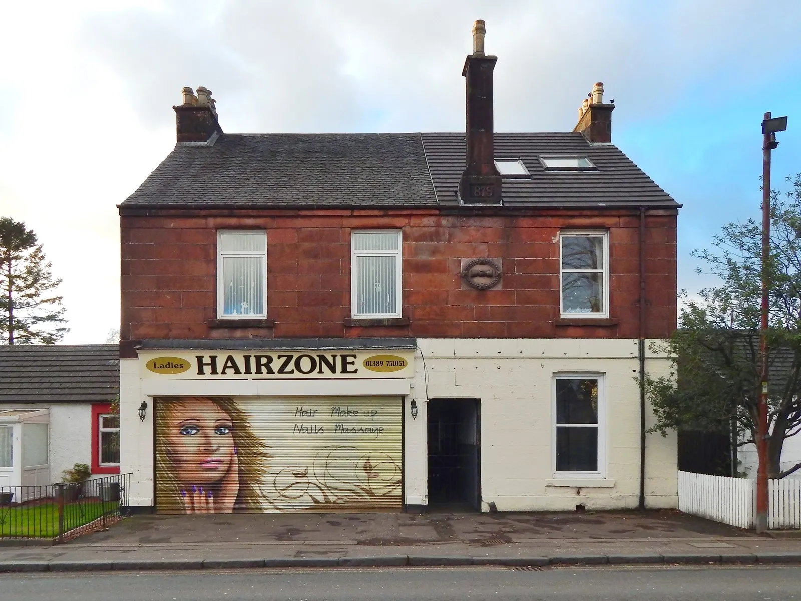 Photo showing: Former co-op building with new mural