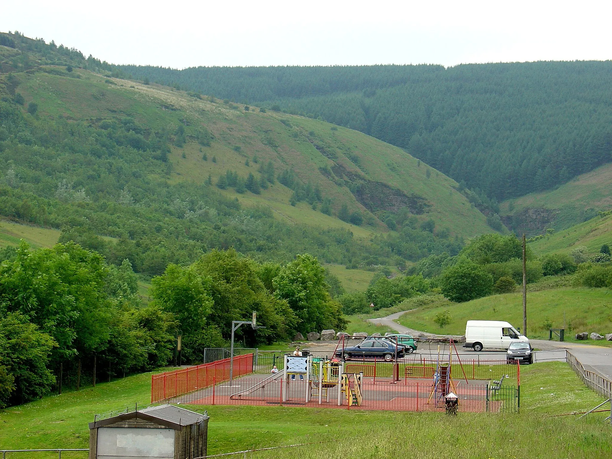 Photo showing: Head of Clydach Vale, Rhondda, showing greening of surrounding slagheaps and new children's playground