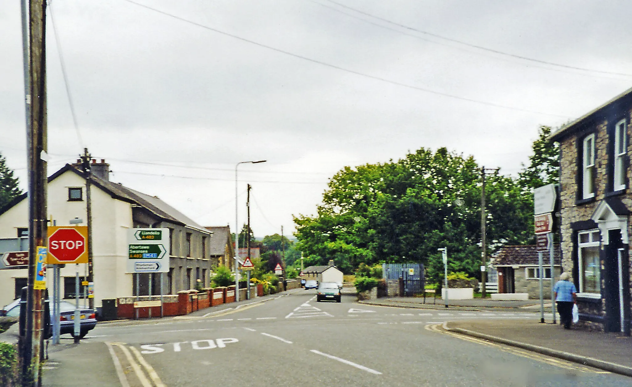 Photo showing: Ffairfach crossroads, near site of former Llandilo Bridge station.
View eastward at crossroads of A476/A483. The station had been just off to the left: ex-LNWR Llandilo - Carmarthen branch, closed 9/9/63.