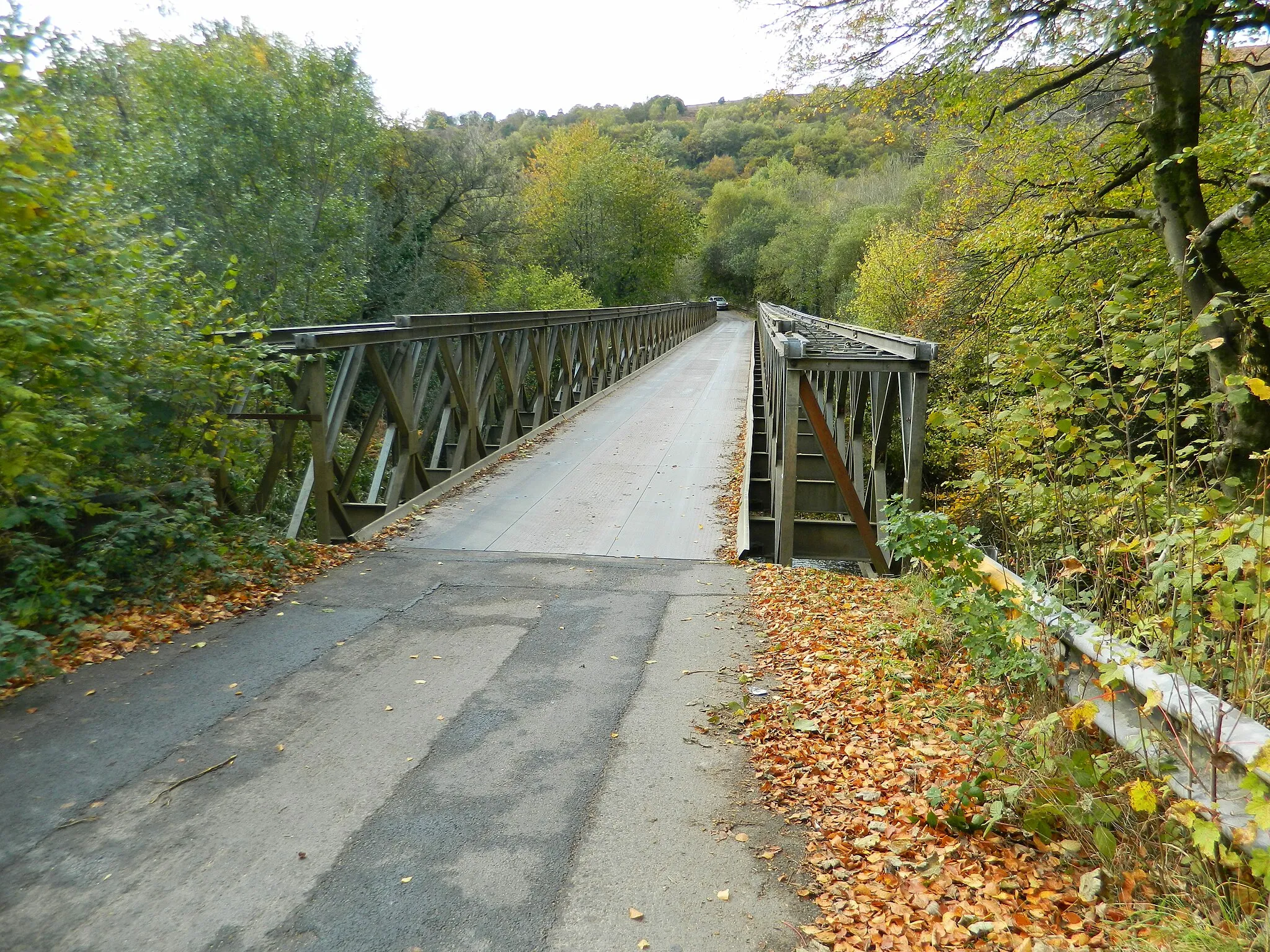 Photo showing: Bridge across the Rhymney River. The road surface is metal plates.