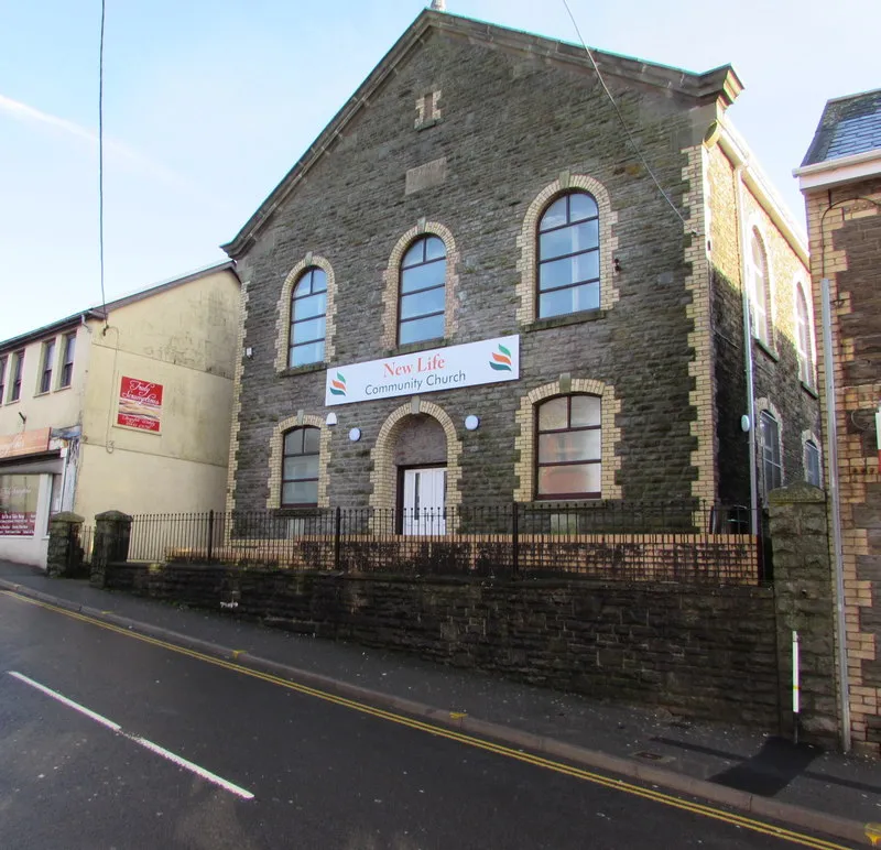 Photo showing: New Life Community Church, Mill Street, Tonyrefail. Viewed in January 2018. A tablet on the wall above the three upper windows 
records that this building was originally Capel Bethel (Welsh for Bethel Chapel) built in 1894.