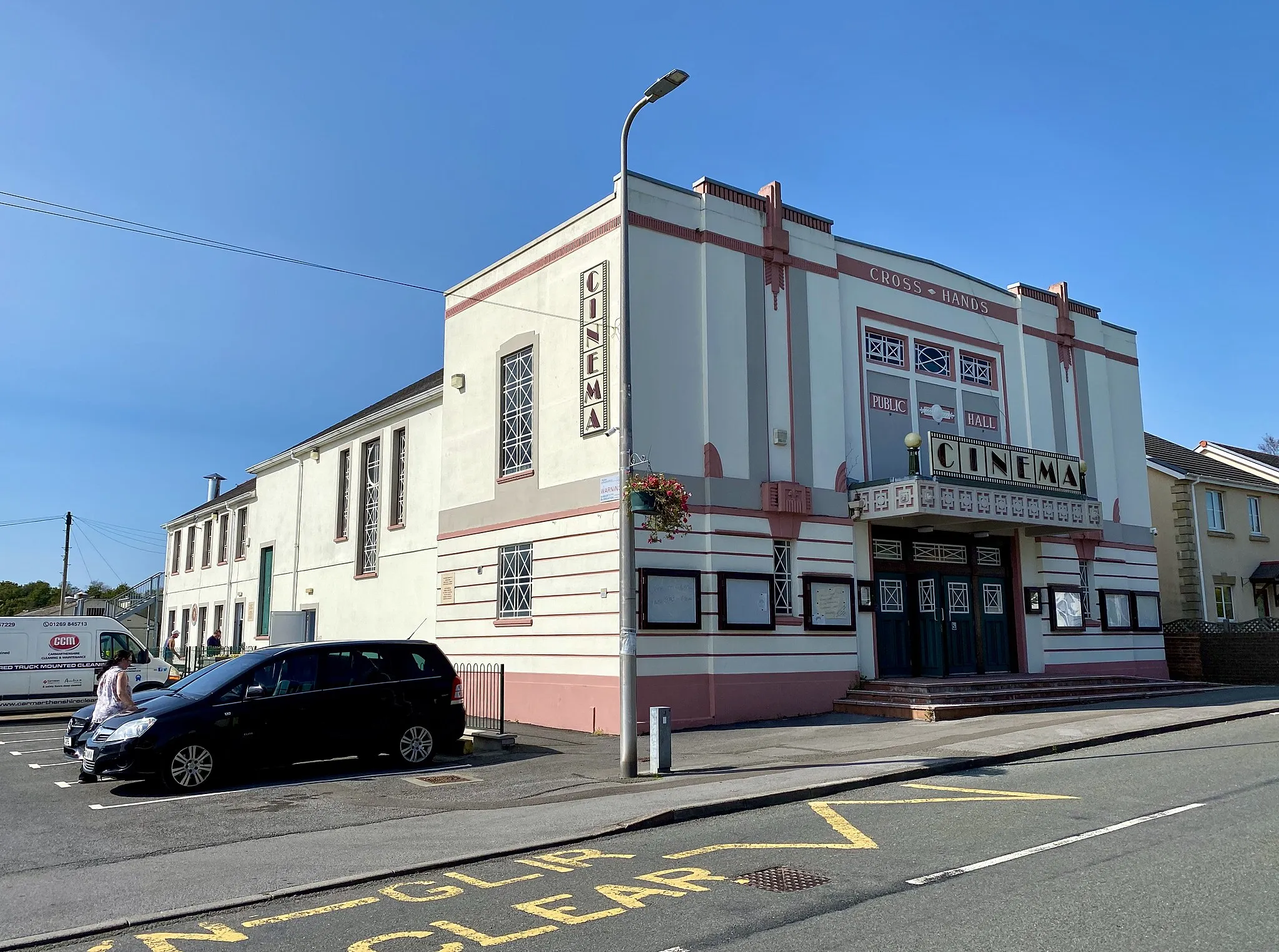 Photo showing: Cross Hands Cinema. Cross Hands Public Hall dates back to 1904, when it served as an entertainment centre for the local area. It underwent restoration in the mid-90s when it re-opened primarily as a cinema, run by volunteers, and it's now a beautiful example of a carefully-restored art deco cinema, one of only three of its kind in Wales.