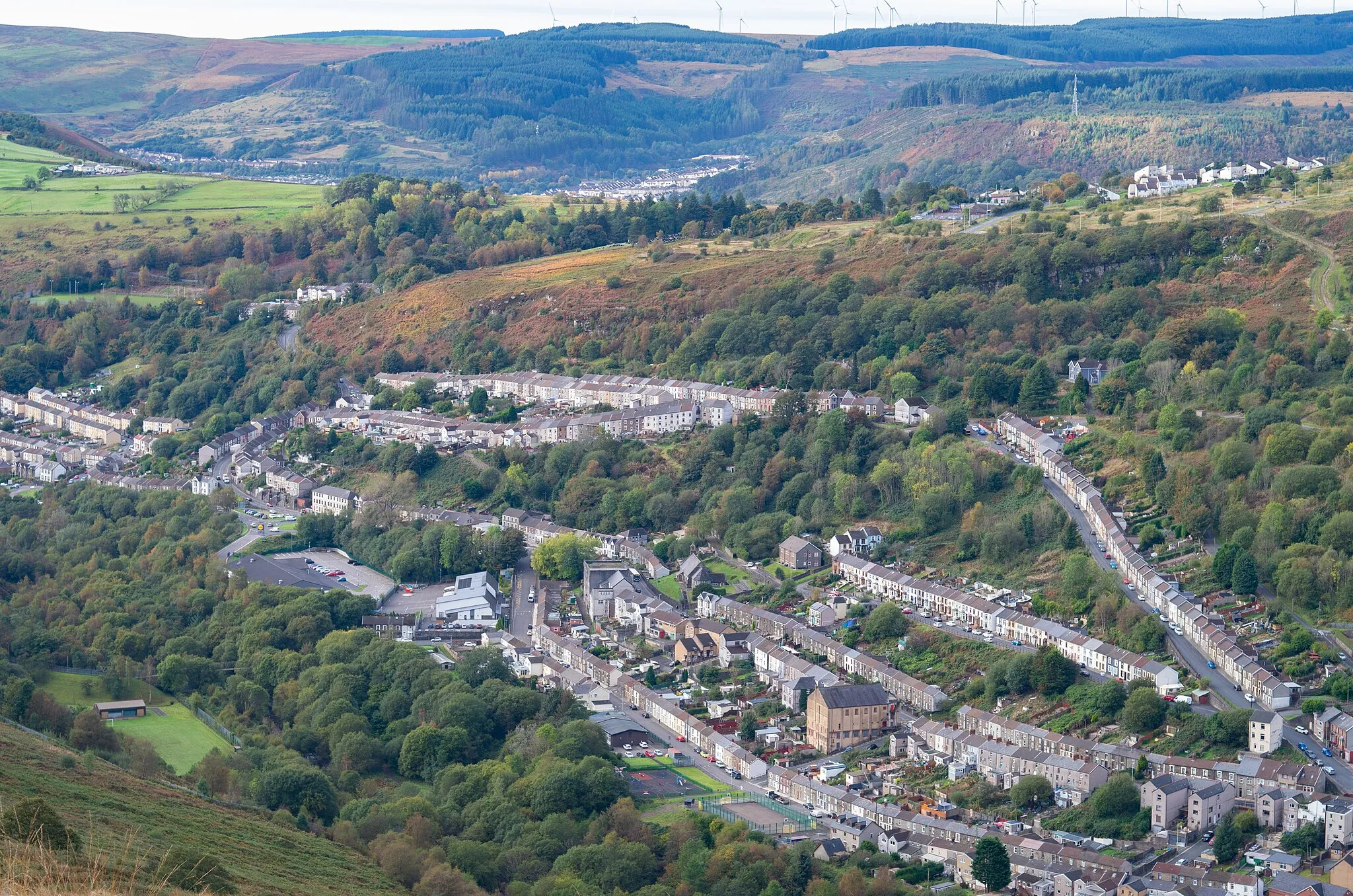 Photo showing: The town of Tylorstown seen from a road higher up on the hillside to the east of the valley.