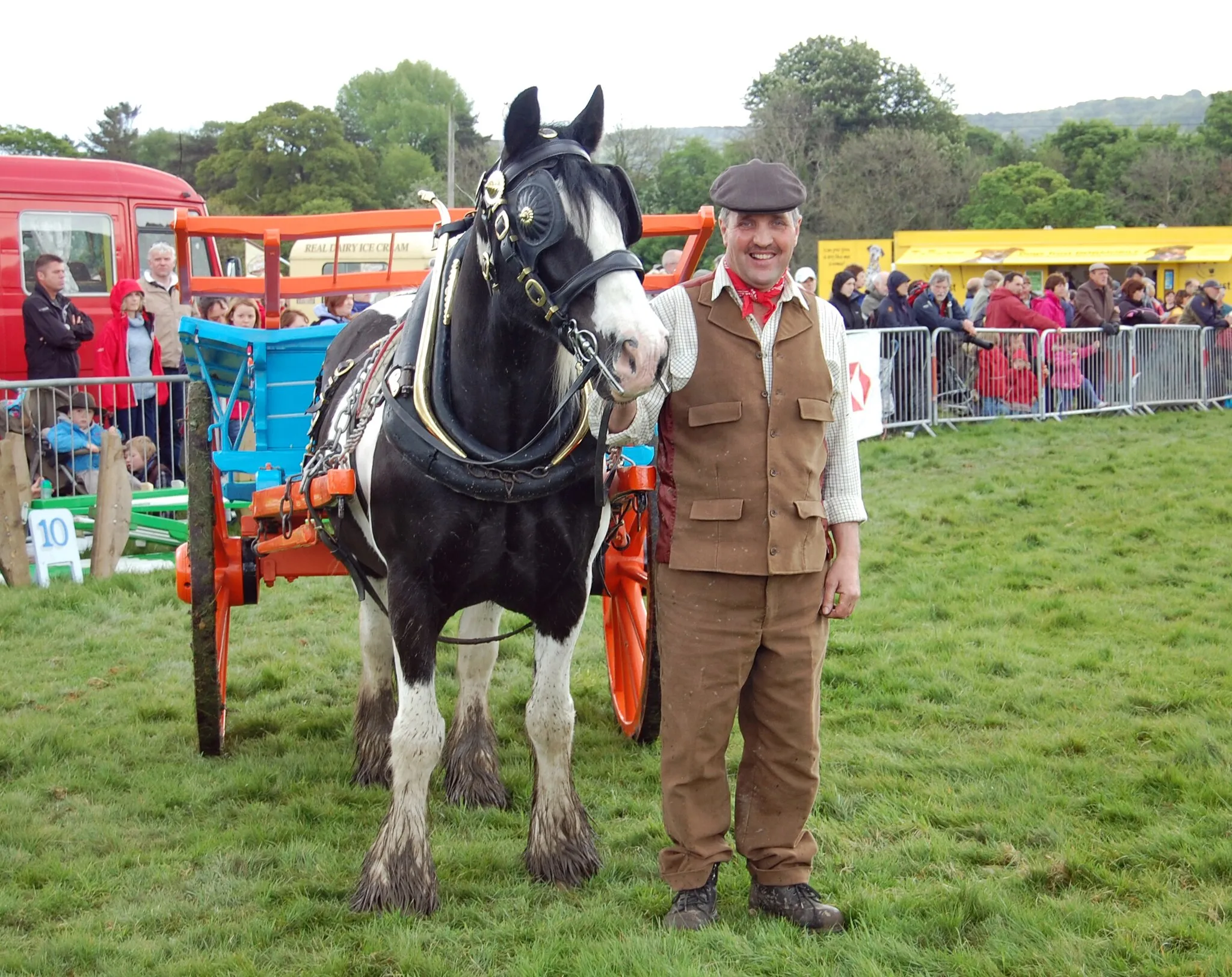 Photo showing: Local resident Kevin Pack, dressed in vintage Yorkshire attire, takes his horse Danny for a turn of the field in front of the crowd at Otley Show.