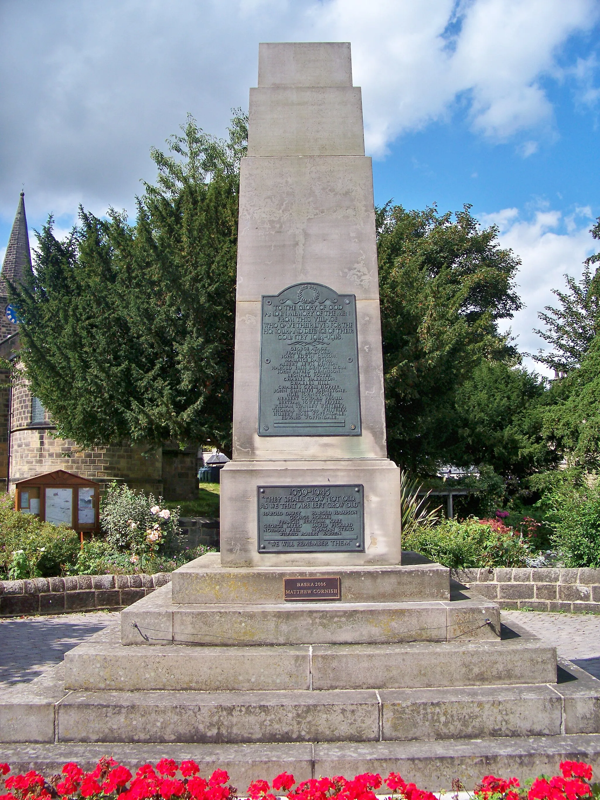 Photo showing: The war memorial in Pool-in Wharfedale, West Yorkshire.  The memorial lists those from Pool who dies in the Great War, World War II and the 2003- Iraq War.  The photograph was taken on the morning of Saturday 22nd August 2009.