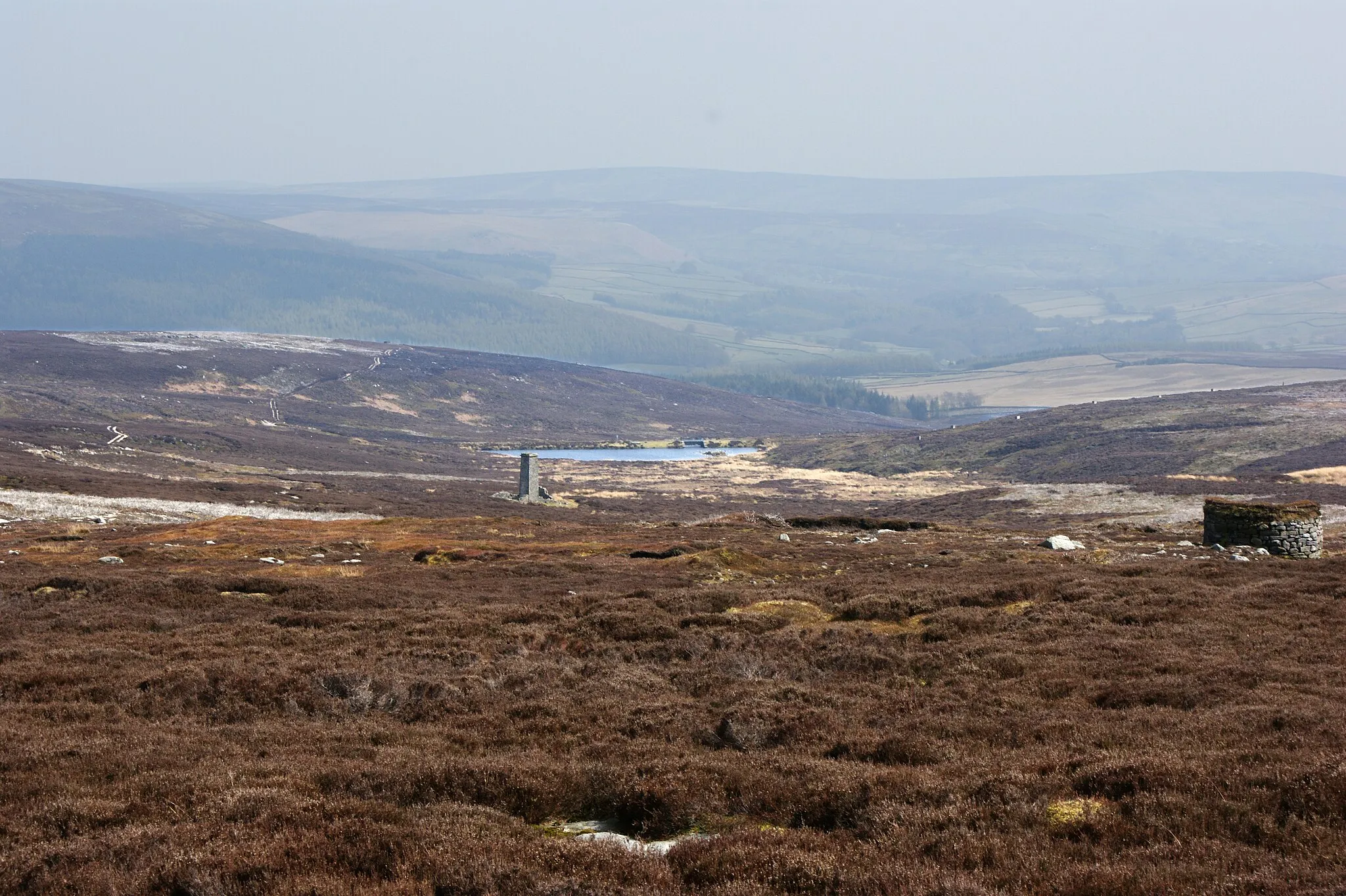 Photo showing: A chimney a grouse butt, and beyond a small unnamed reservoir