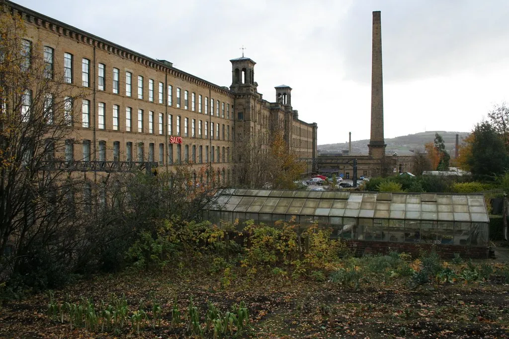 Photo showing: Allotments, Saltaire. The railway line and Salts Mill can be seen on the left.