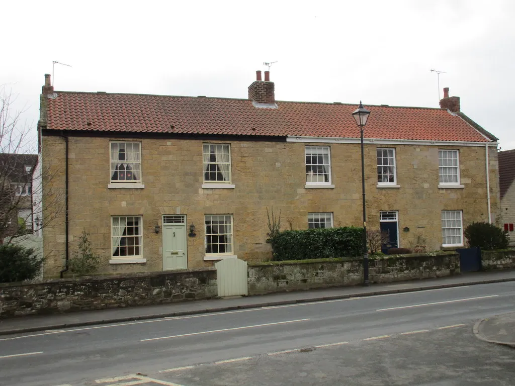 Photo showing: Photograph of a pair of restored houses opposite Church Lane, Darrington, West Yorkshire, England