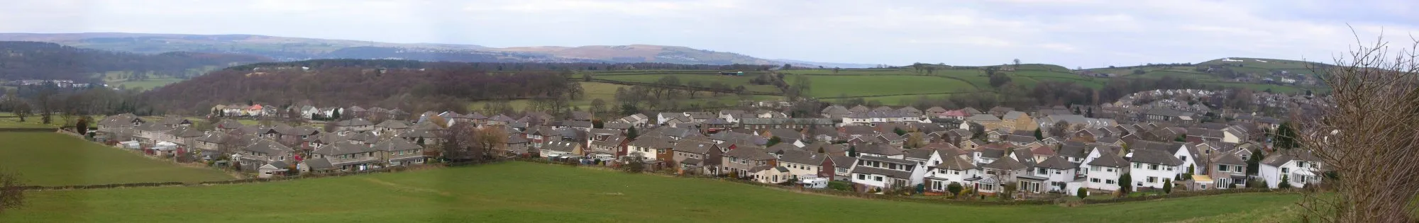 Photo showing: Panorama taken by myself from Tan House Lane overlooking Wilsden village.
A larger version is available on Flickr http://static.flickr.com/42/119360347_1476d7abf9_o.jpg

Source: https://www.flickr.com/photos/mgspiller/119360347/