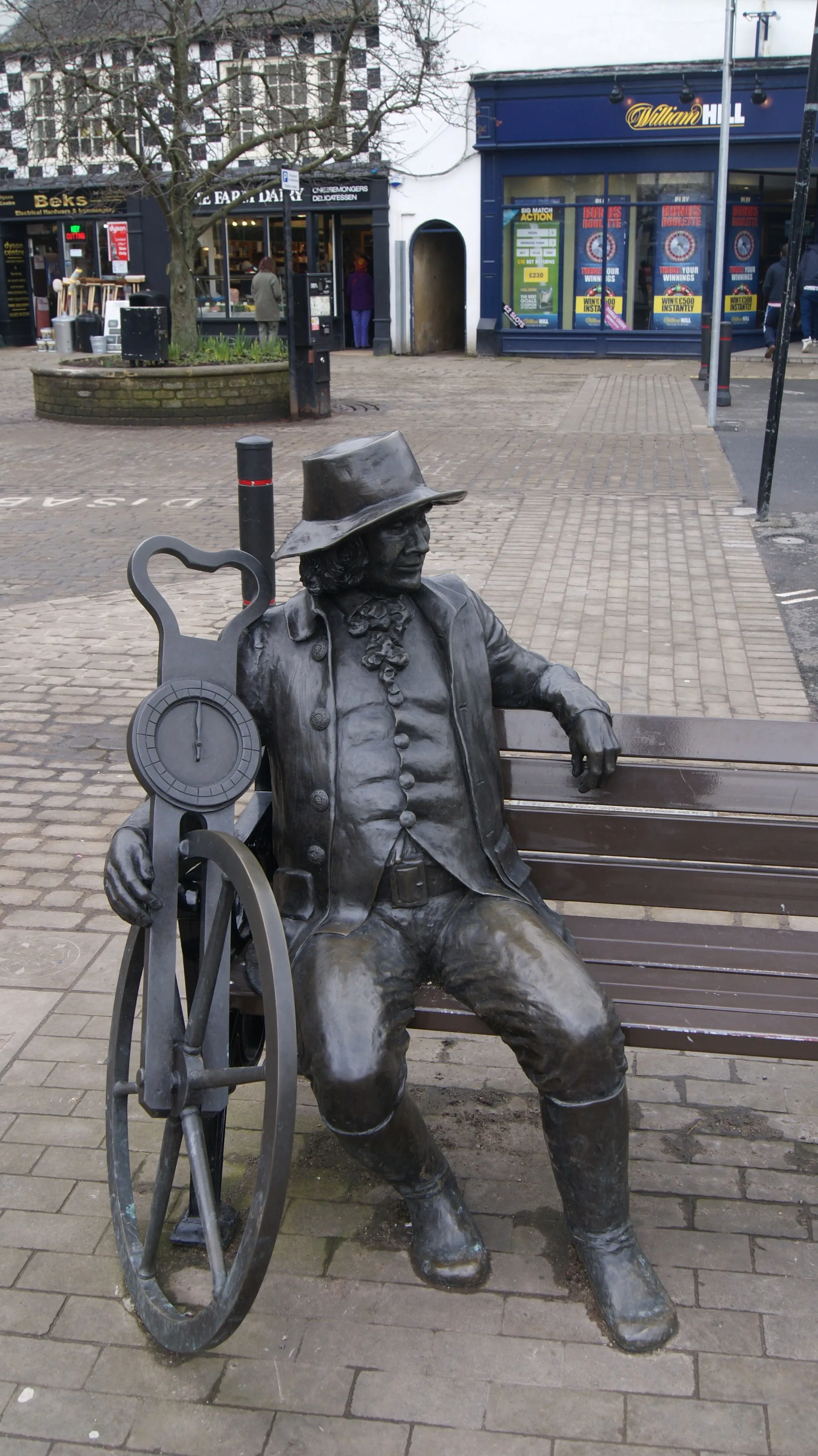 Photo showing: Blind Jack Metcalf of Knaresborough statue, Market Place, Knaresborough, North Yorkshire.  Taken on the afternoon of Tuesday the 19th of March 2013.