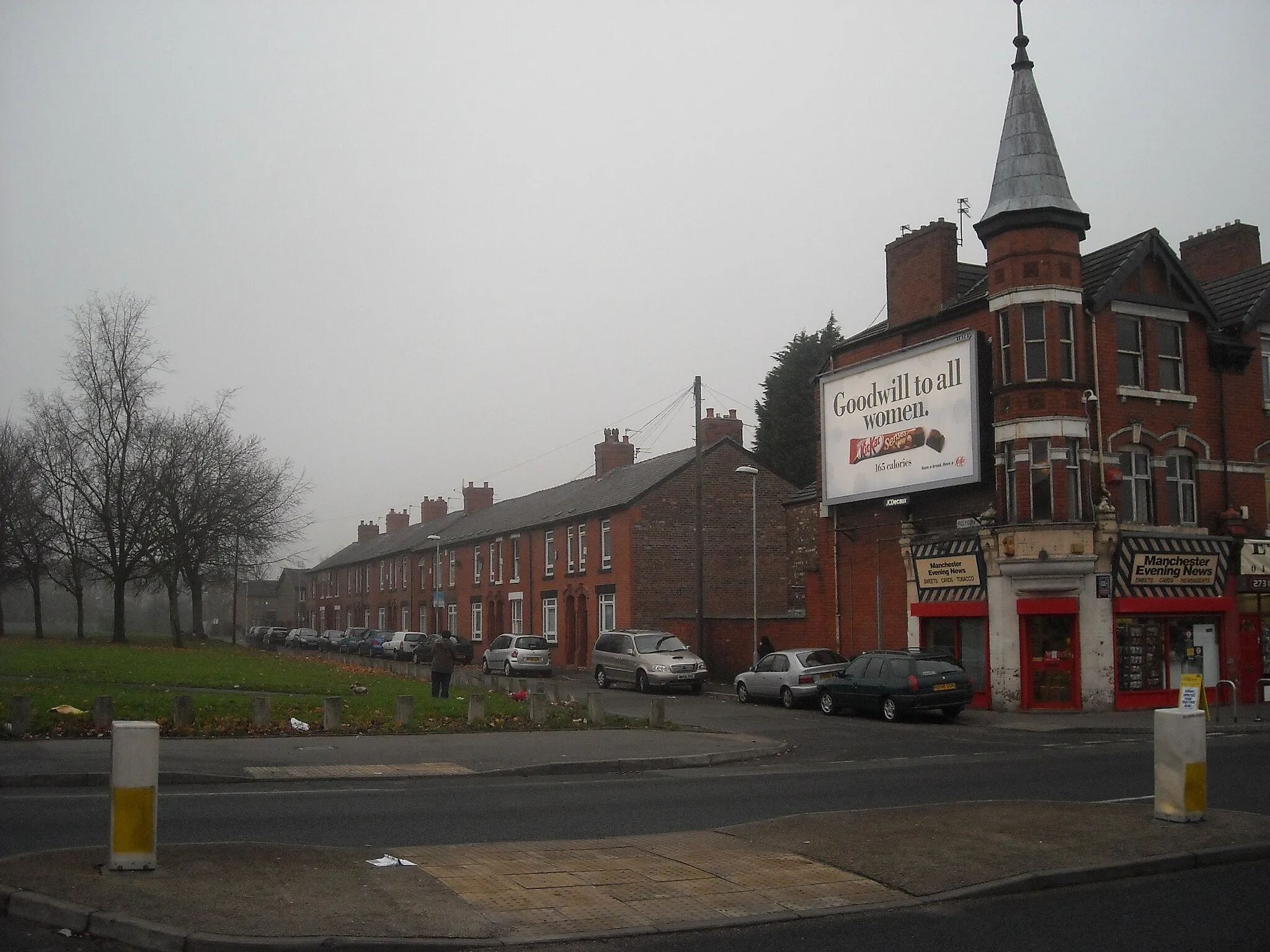 Photo showing: A typical billboard in Ardwick, near to the Apollo theatre.