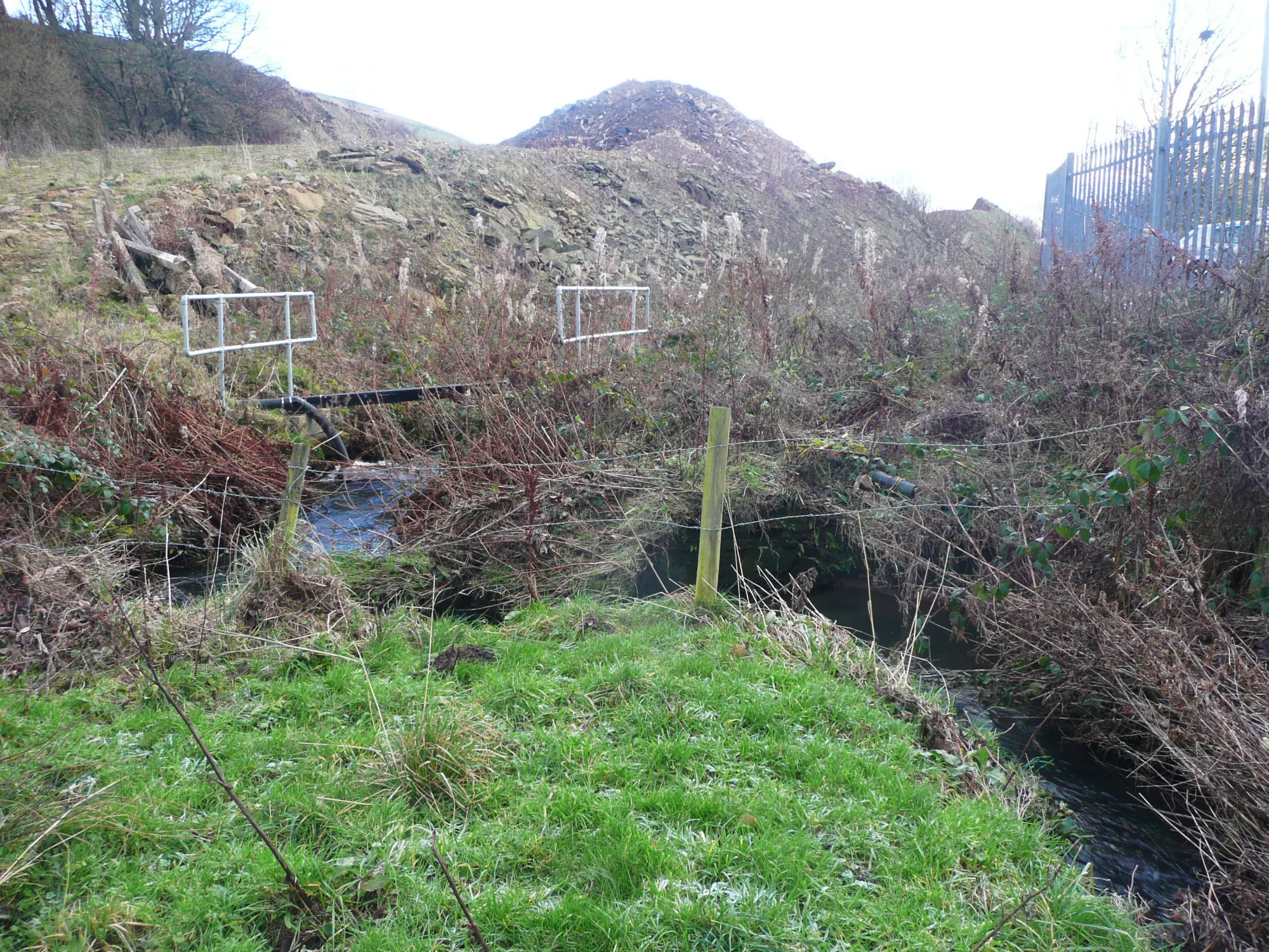 Photo showing: A double bend in Strines Beck near where the footbridge carrying a branch of Queensbury FP31 used to be