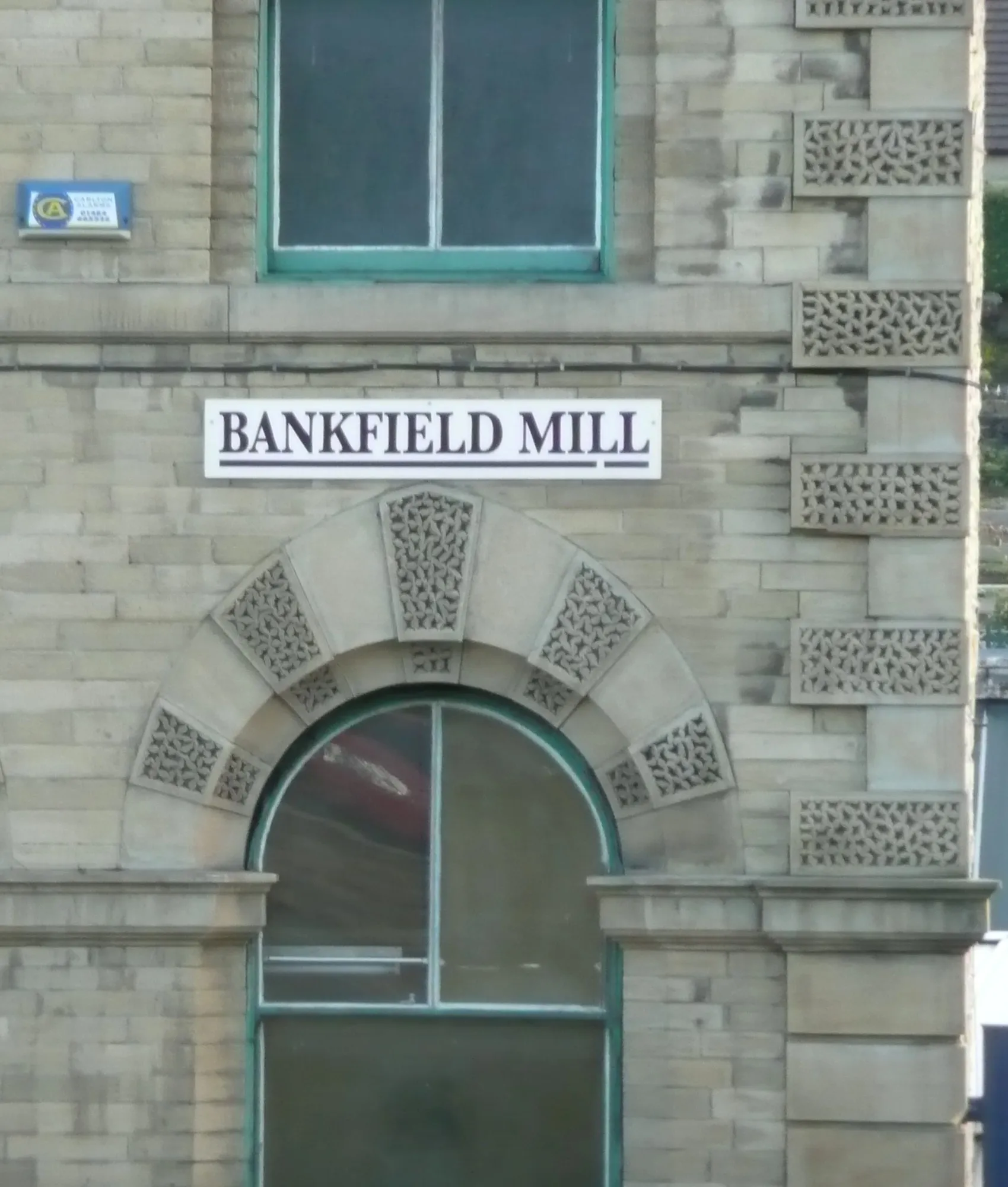 Photo showing: Decorative stonework, Bankfield Mill, Wakefield Road, Moldgreen