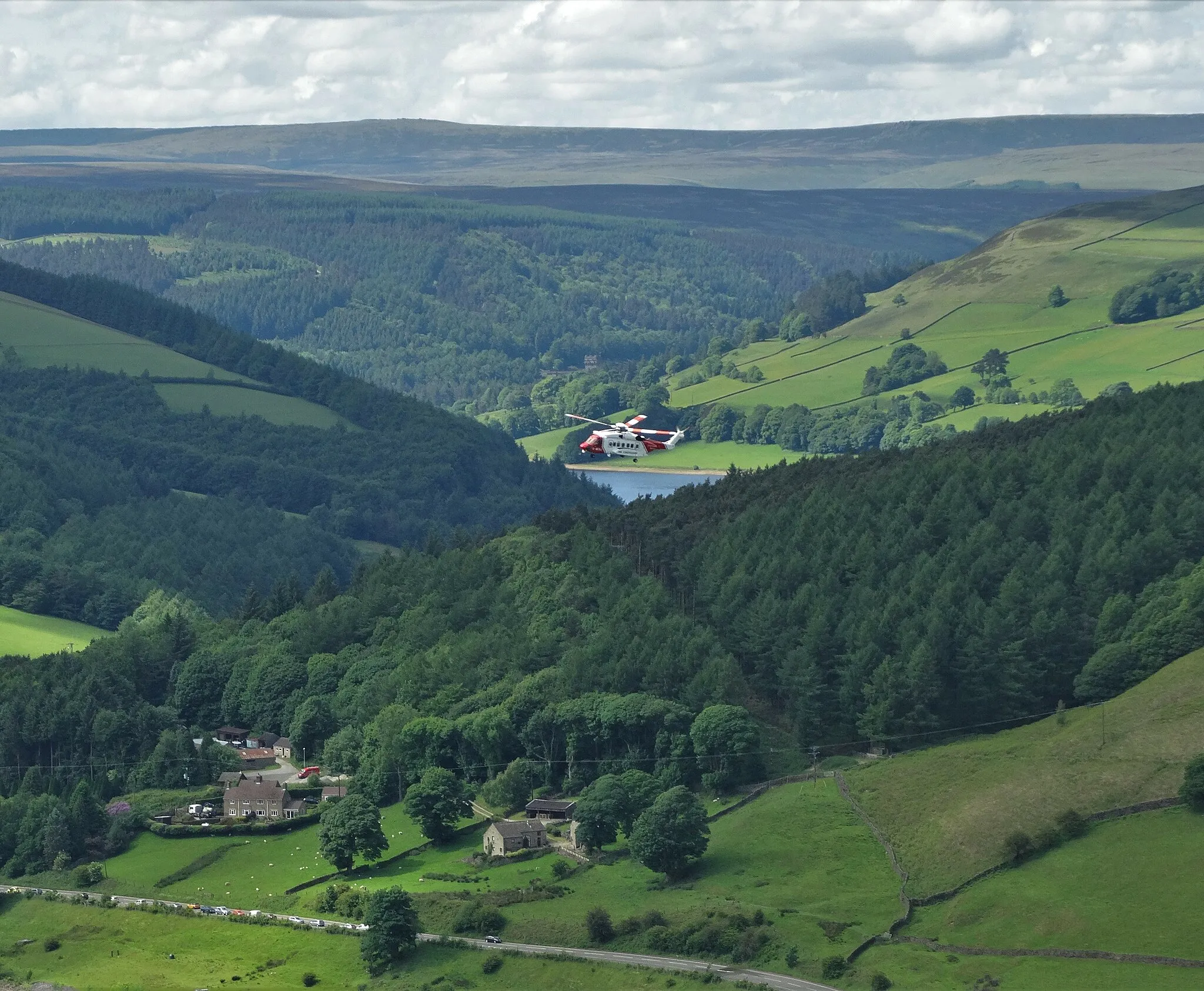 Photo showing: HM Coastguard helicopter over Ladybower