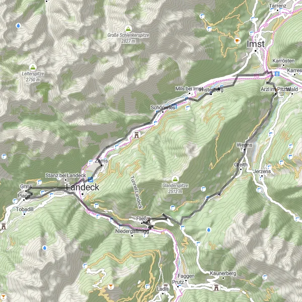 Miniatura della mappa di ispirazione al ciclismo "Tour panoramico tra castelli e vette" nella regione di Tirol, Austria. Generata da Tarmacs.app, pianificatore di rotte ciclistiche