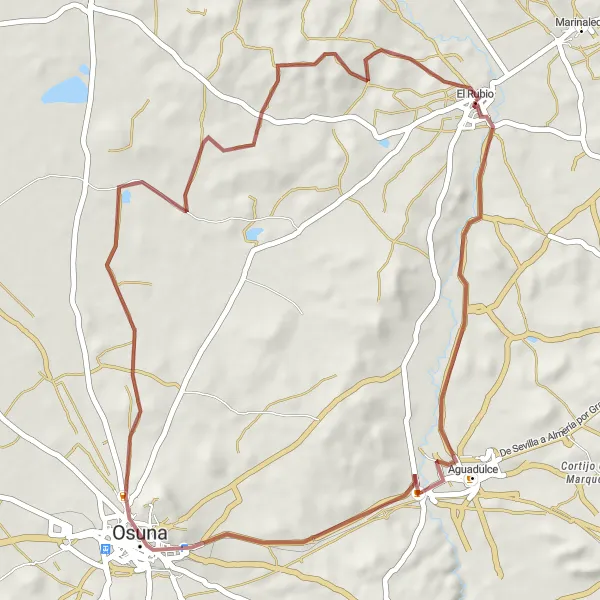 Miniatura della mappa di ispirazione al ciclismo "Avventura in bicicletta tra El Rubio e Osuna" nella regione di Andalucía, Spain. Generata da Tarmacs.app, pianificatore di rotte ciclistiche