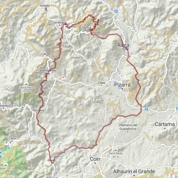 Miniatura della mappa di ispirazione al ciclismo "Gravel route from Guaro to Alozaina, Carratraca, and Hacho" nella regione di Andalucía, Spain. Generata da Tarmacs.app, pianificatore di rotte ciclistiche