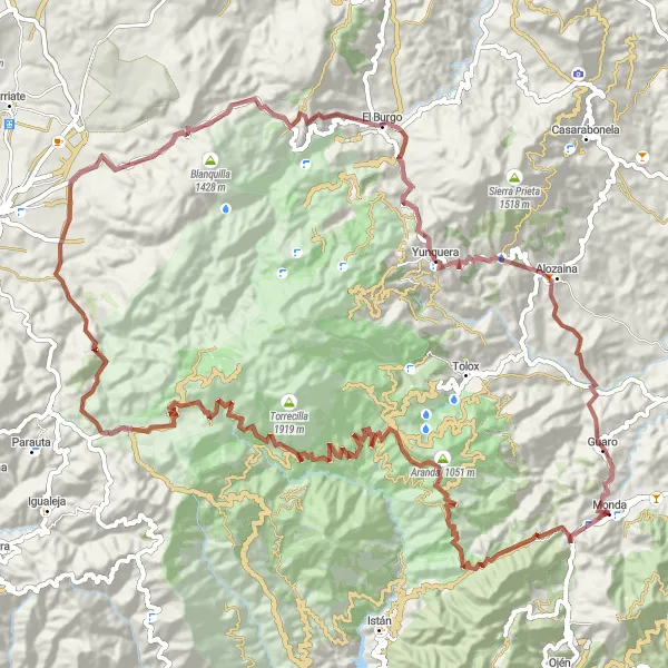 Miniature de la carte de l'inspiration cycliste "Parcours de montagne éreintant de Monda à Guaro" dans la Andalucía, Spain. Générée par le planificateur d'itinéraire cycliste Tarmacs.app