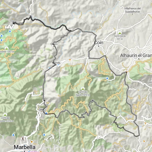 Map miniature of "Tolox - Coín - Mirador de Ojén - Ojén - Mirador Cruz Caravaca - Guaro" cycling inspiration in Andalucía, Spain. Generated by Tarmacs.app cycling route planner