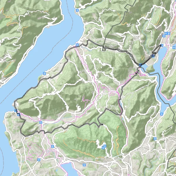 Miniatura della mappa di ispirazione al ciclismo "Giro in bicicletta intorno ad Agno" nella regione di Ticino, Switzerland. Generata da Tarmacs.app, pianificatore di rotte ciclistiche
